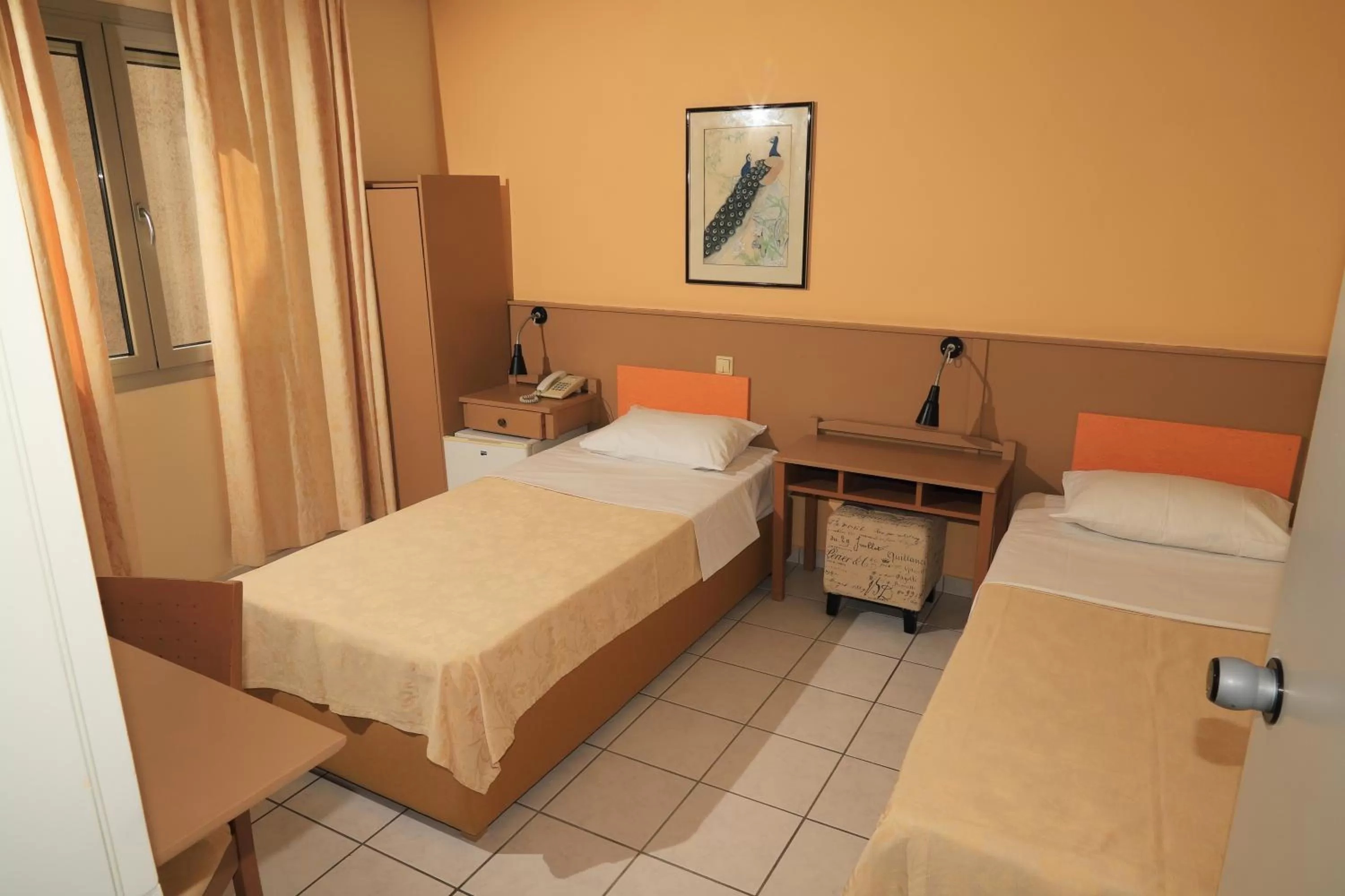 Bed in IKAROS Hotel ELLINIKO