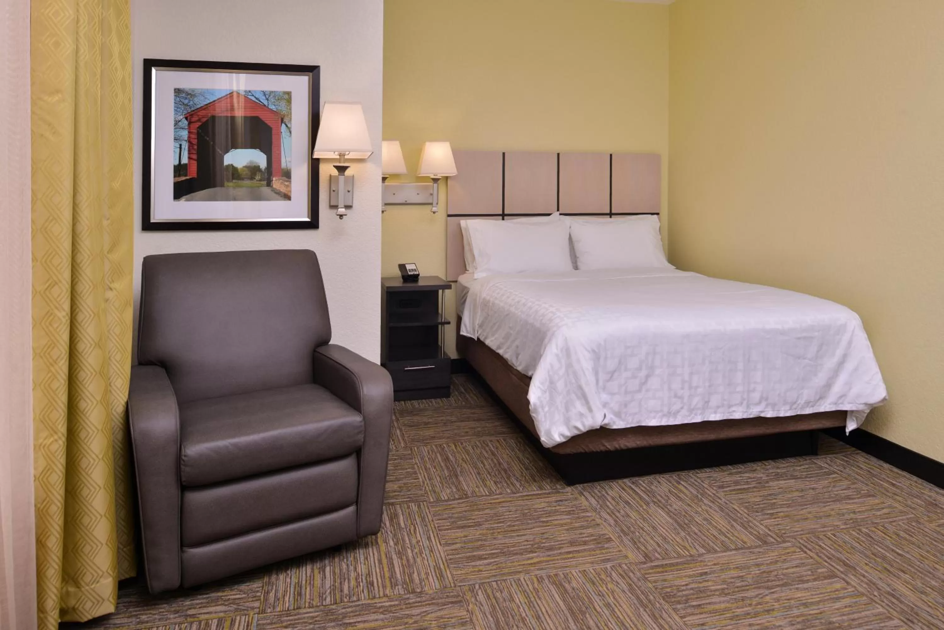 Photo of the whole room, Bed in Candlewood Suites Terre Haute by IHG