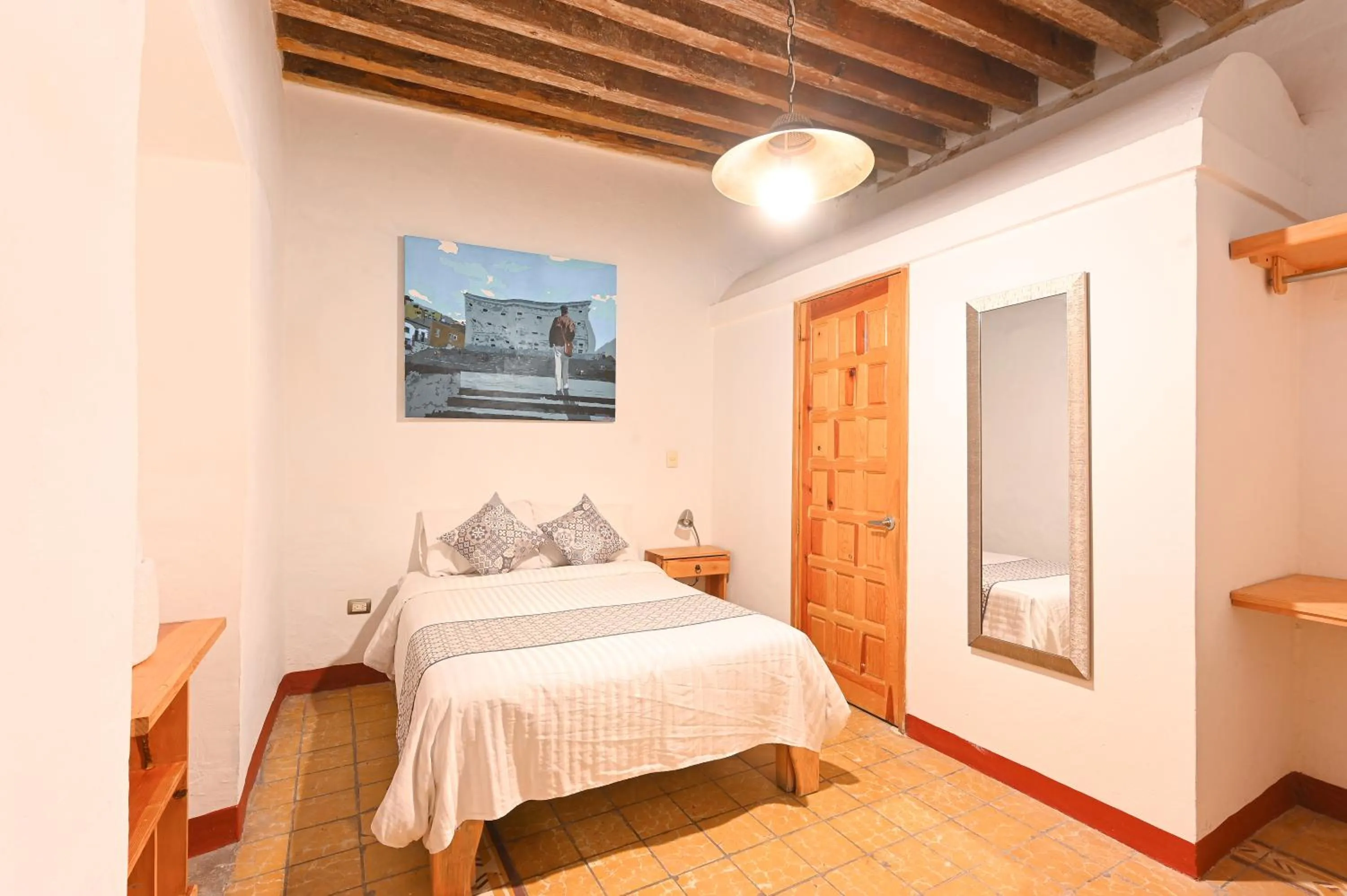 Bed in Hotel Meson Cuevano