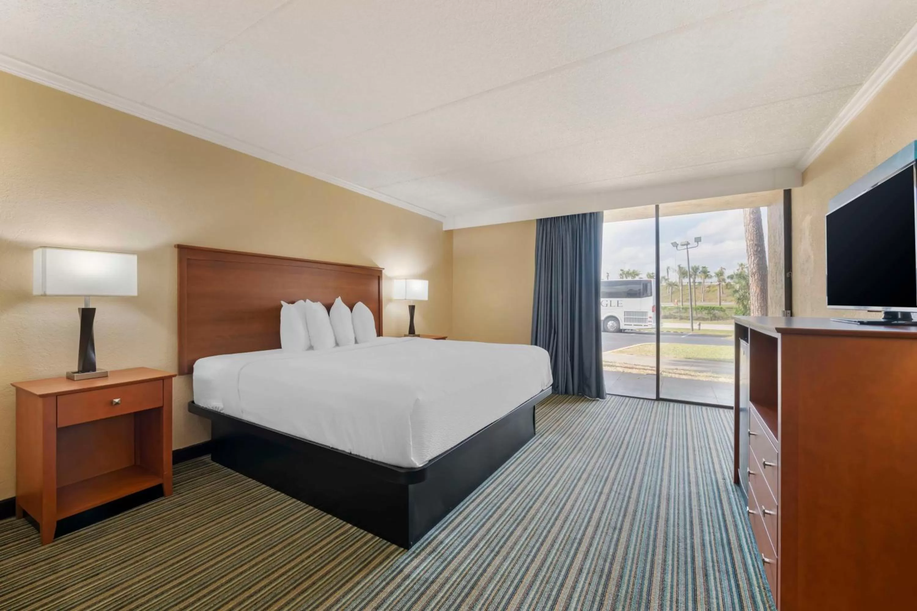 King Room with Roll-in Shower and Balcony - Non-Smoking/Disability Access in Best Western International Speedway Hotel
