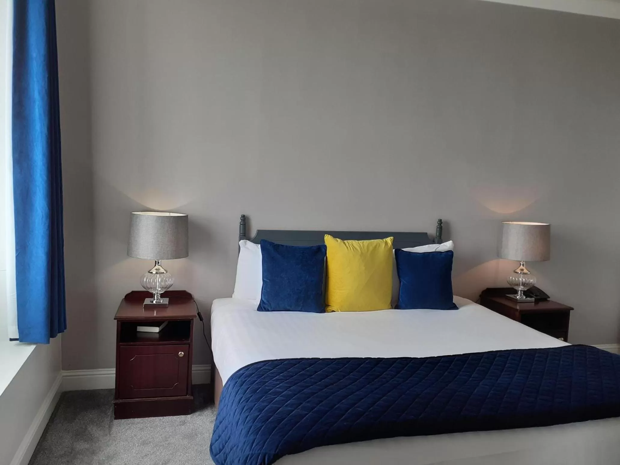 Bed in Commodore Hotel