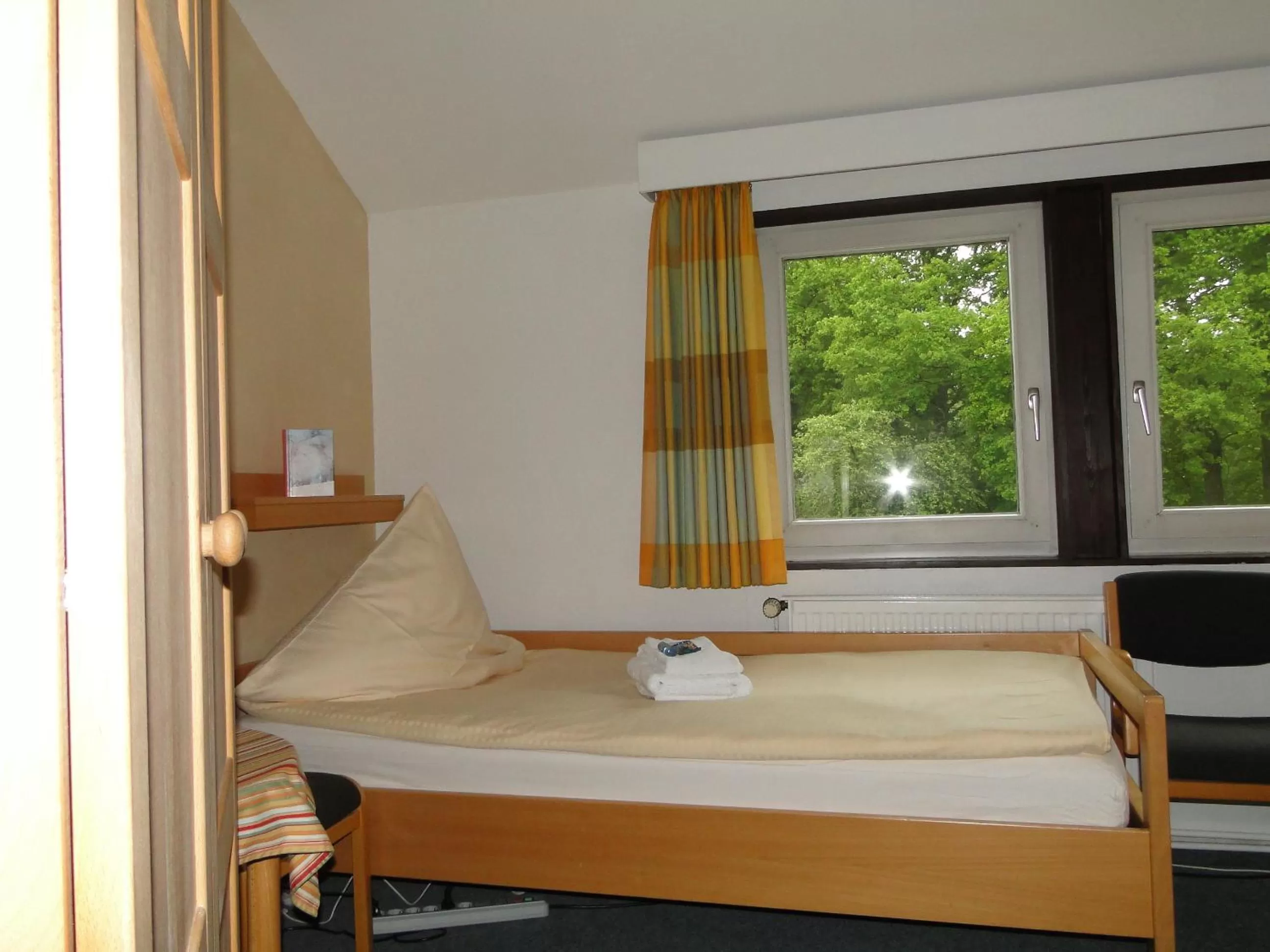 Photo of the whole room, Bed in Ludwig-Harms-Haus Hermannsburg