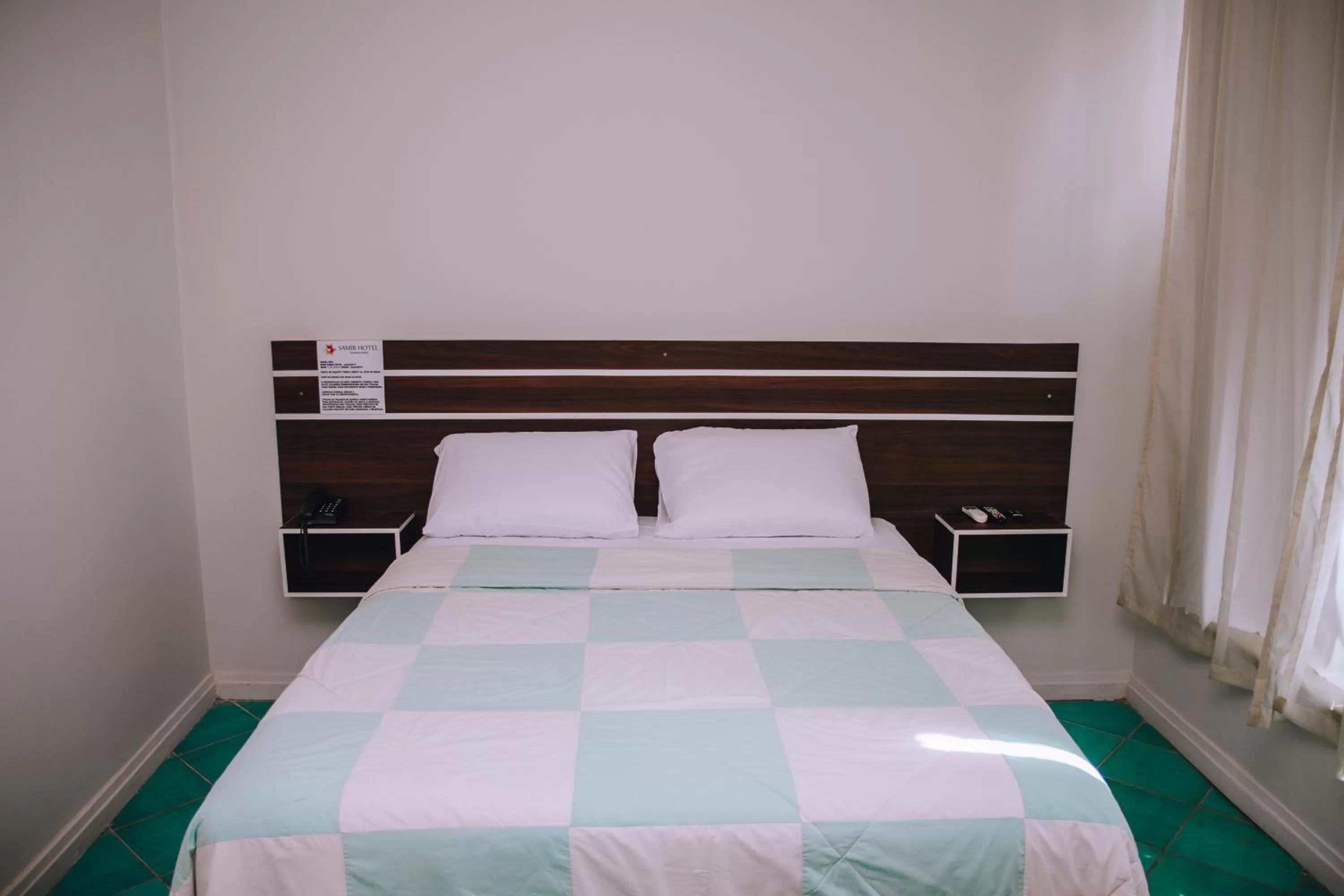 Bed in SAMIR HOTEL COMFORT