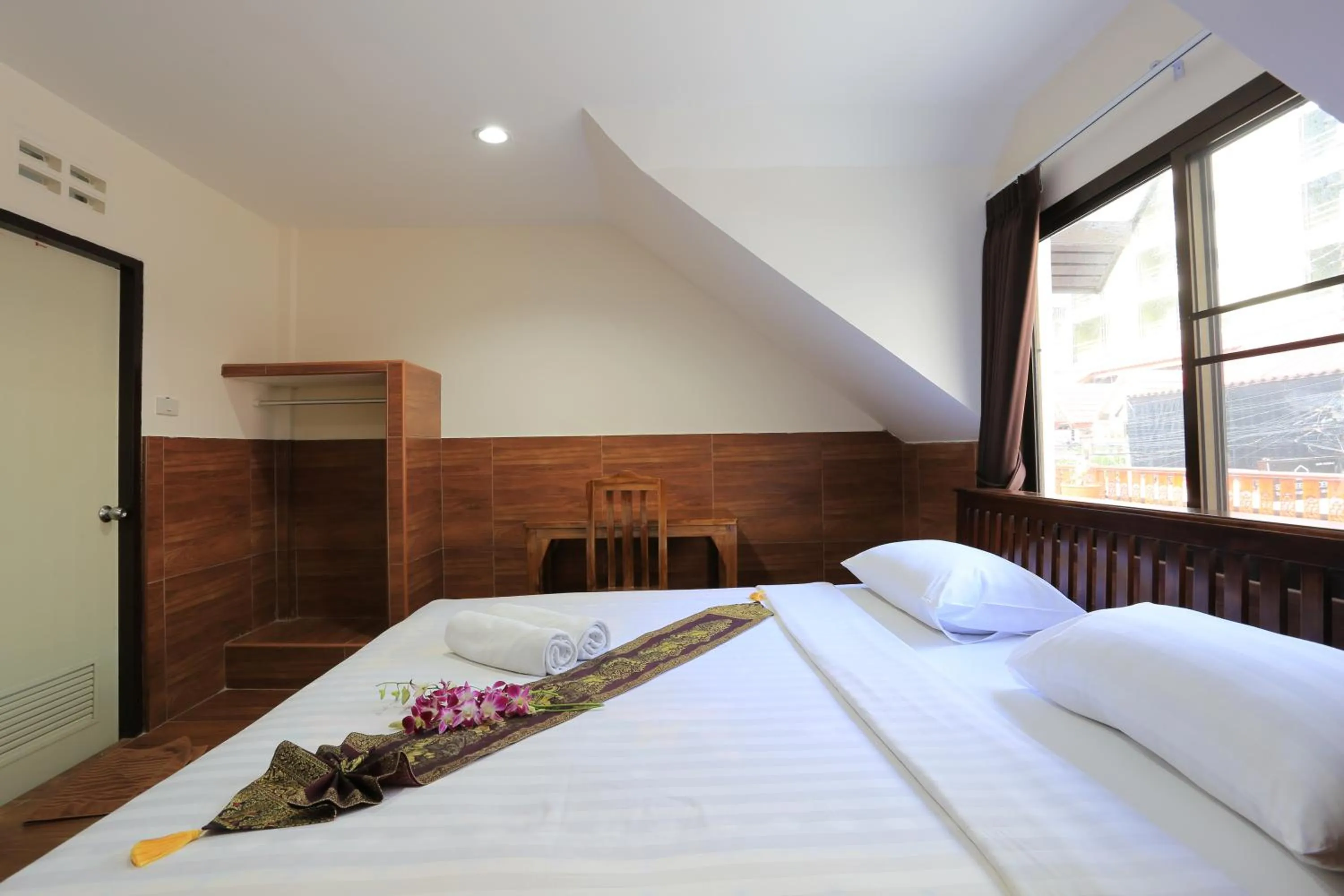 Bed in The Siam Guest House - SHA Extra Plus