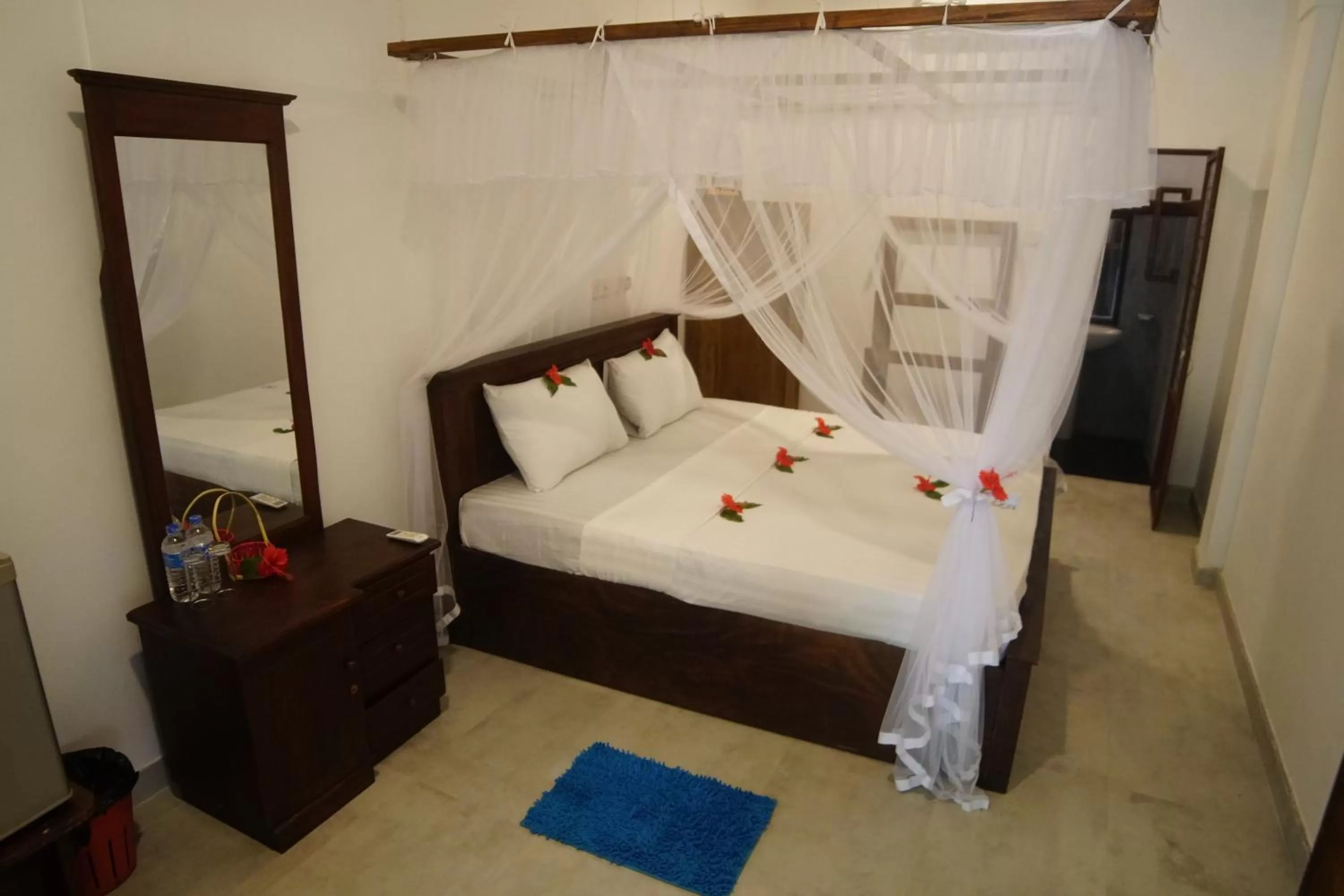 Bed in Turtle Bay Beach Resort