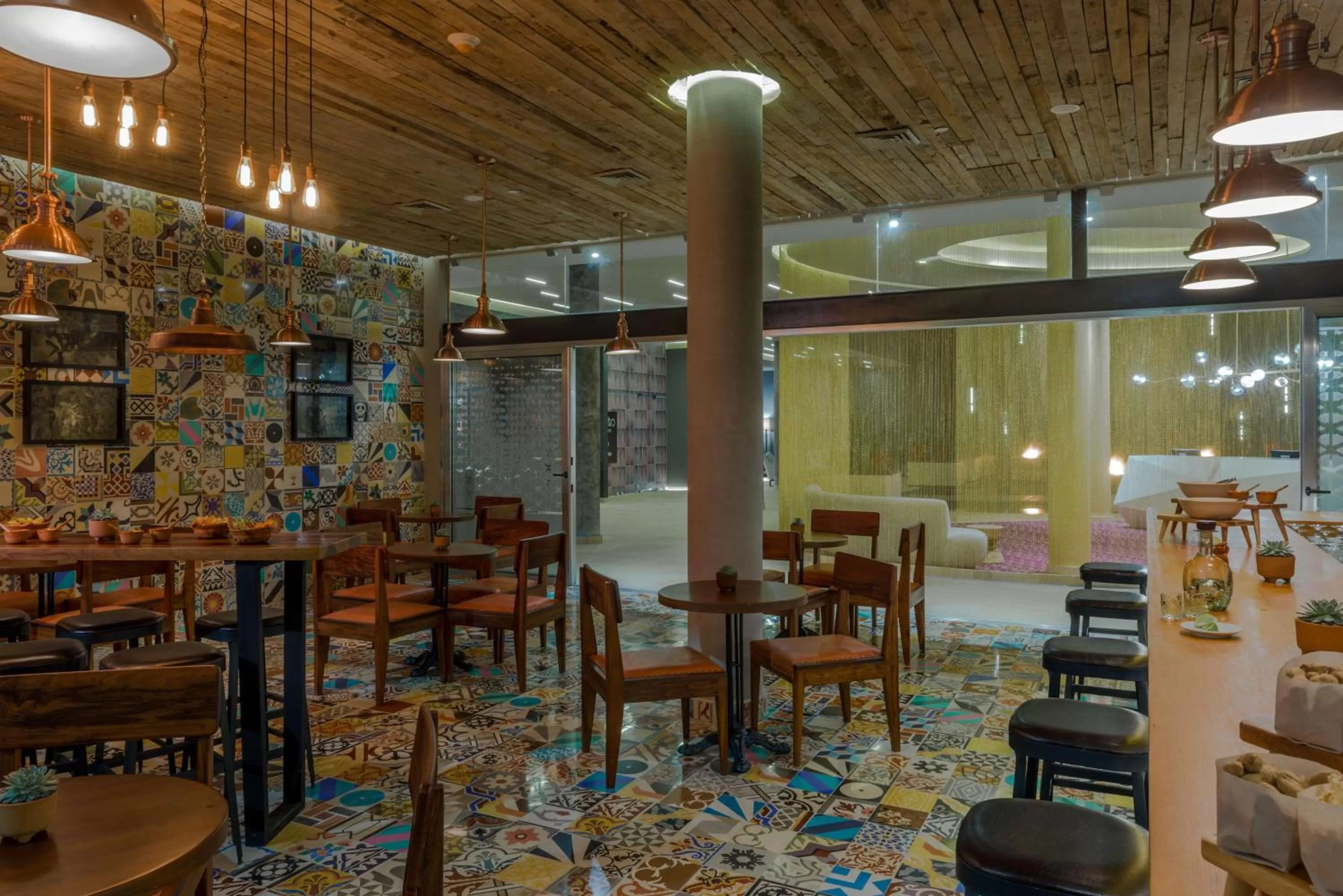 Restaurant/places to eat in The Fives Downtown Hotel & Residences, Curio Collection by Hilton