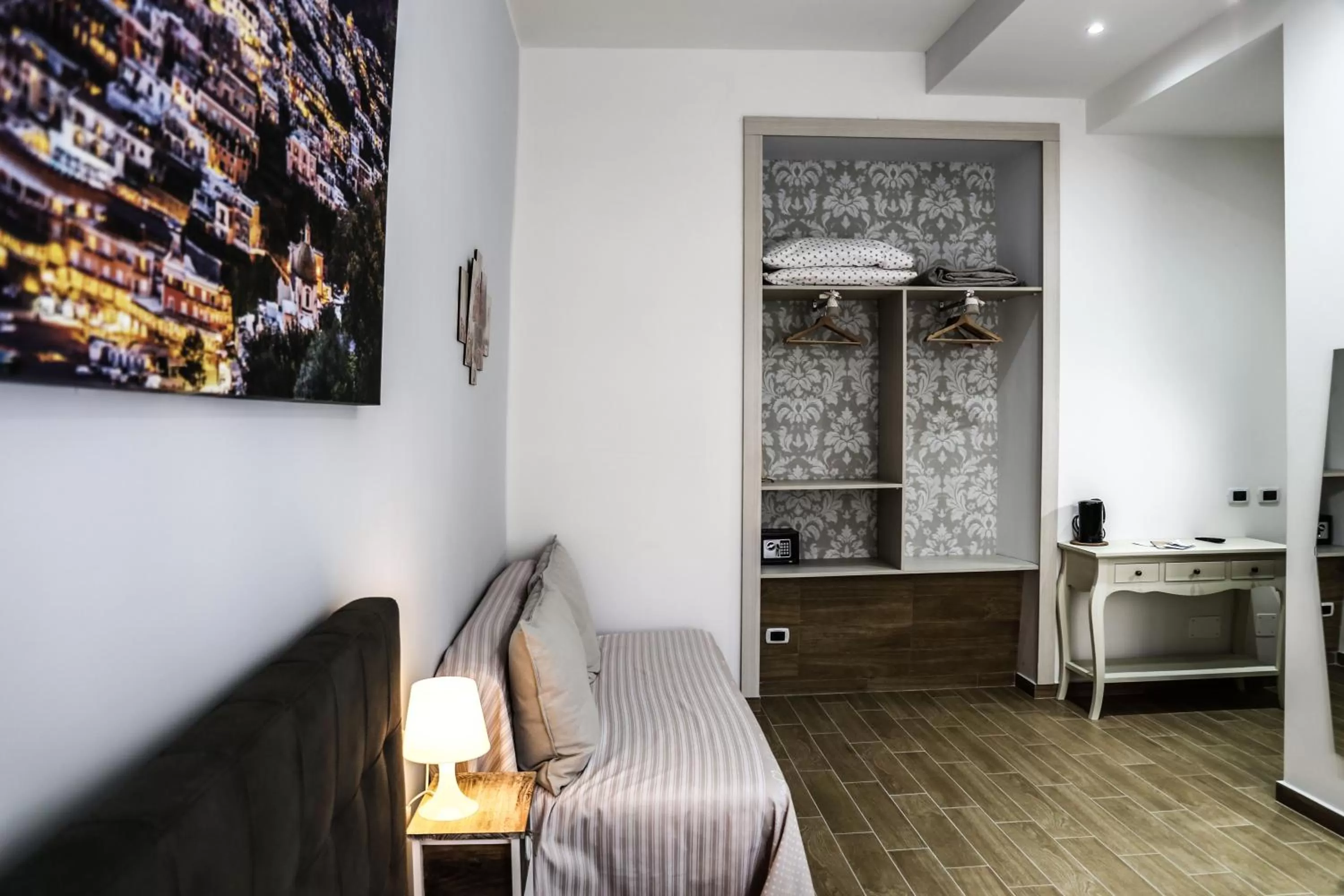 Bed, Seating Area in B&B Caracciolo 109