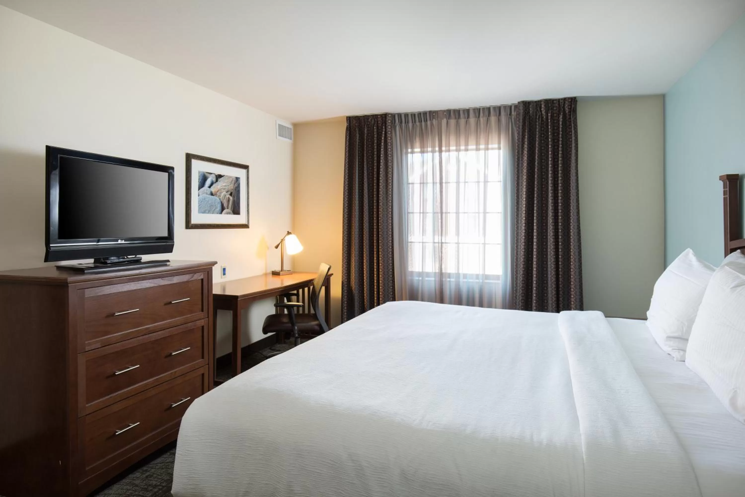 Photo of the whole room, Bed in Staybridge Suites Toledo/Maumee by IHG