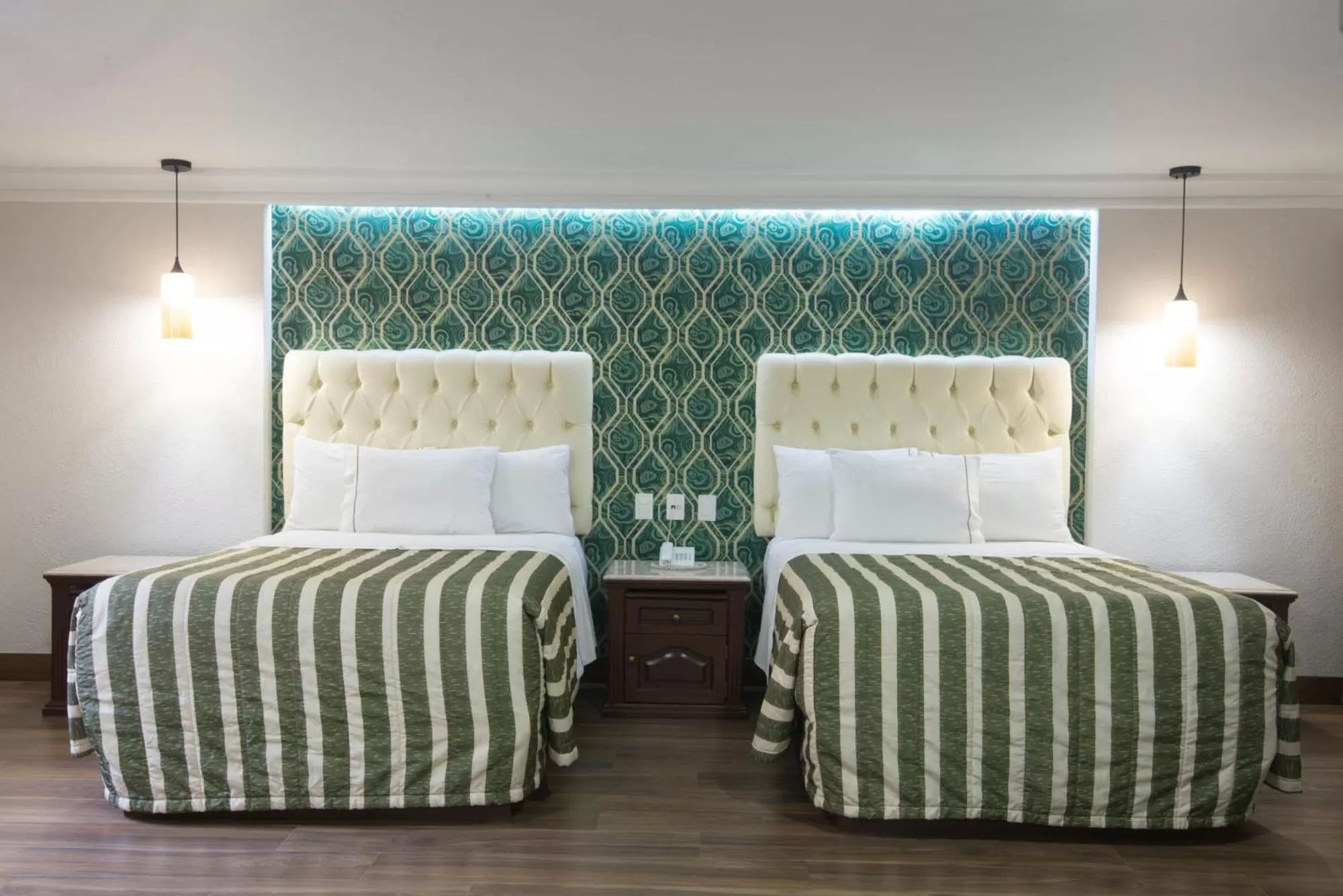 Bed in Hotel Casino Plaza