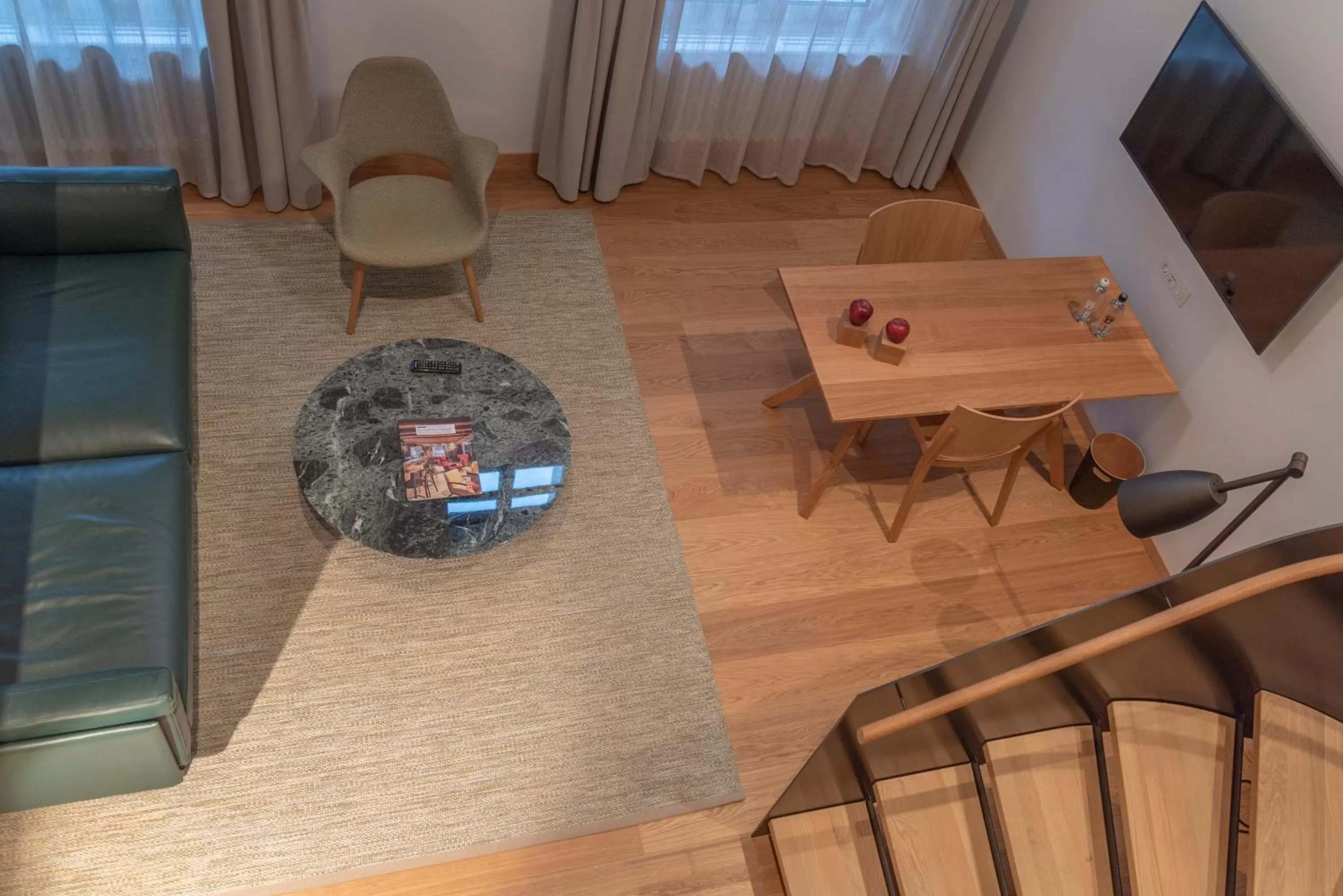 Living room in CASPAR Swiss Quality Hotel