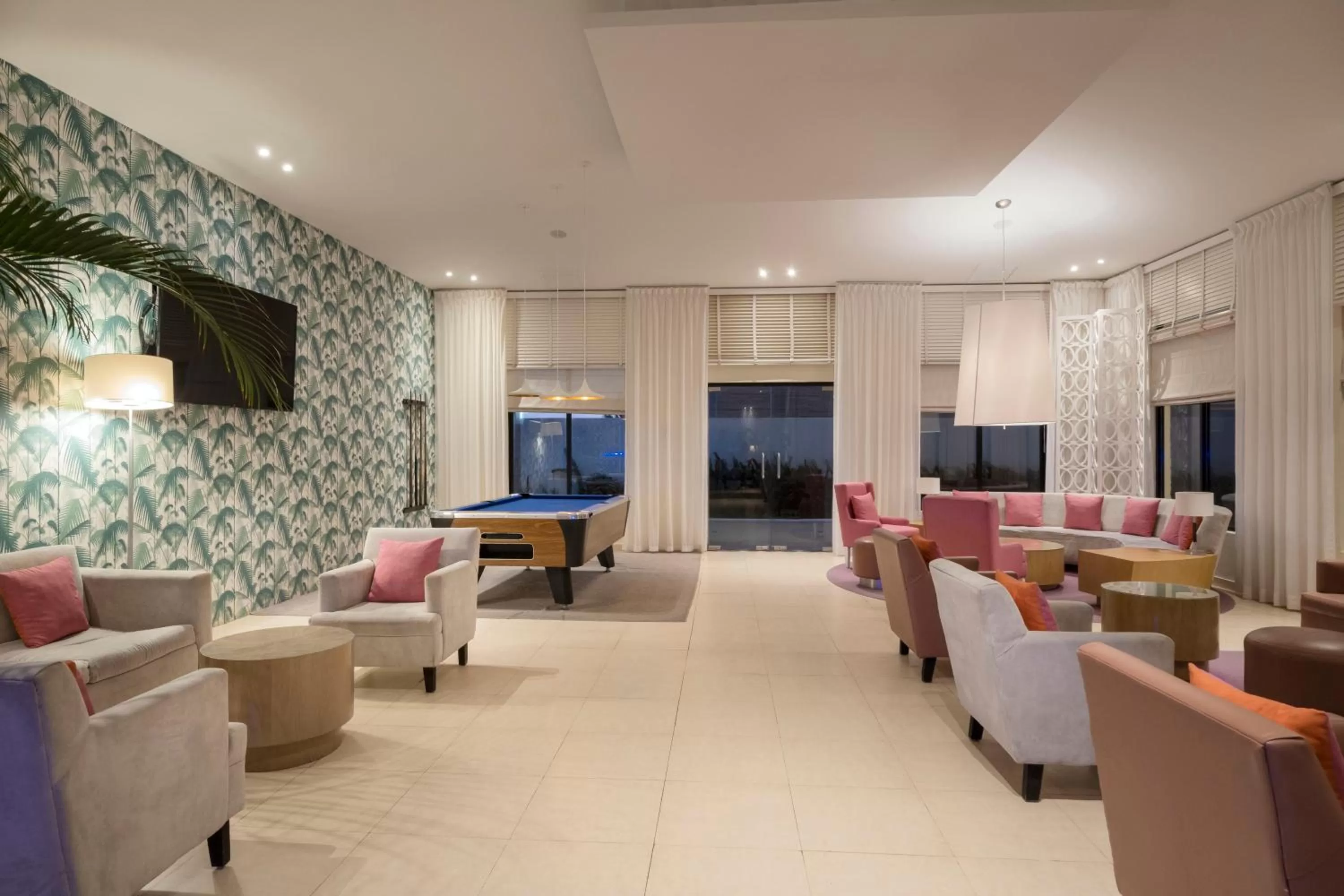 Communal lounge/ TV room in Hotel NYX Cancun