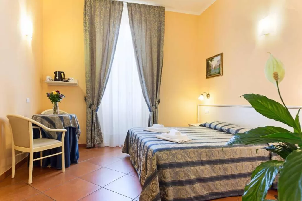 Photo of the whole room, Bed in Vatican Town