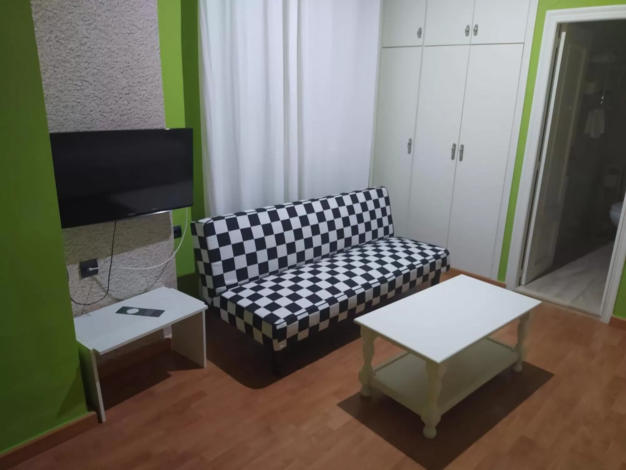 Communal lounge/ TV room, Seating Area in Hotel Aro'S