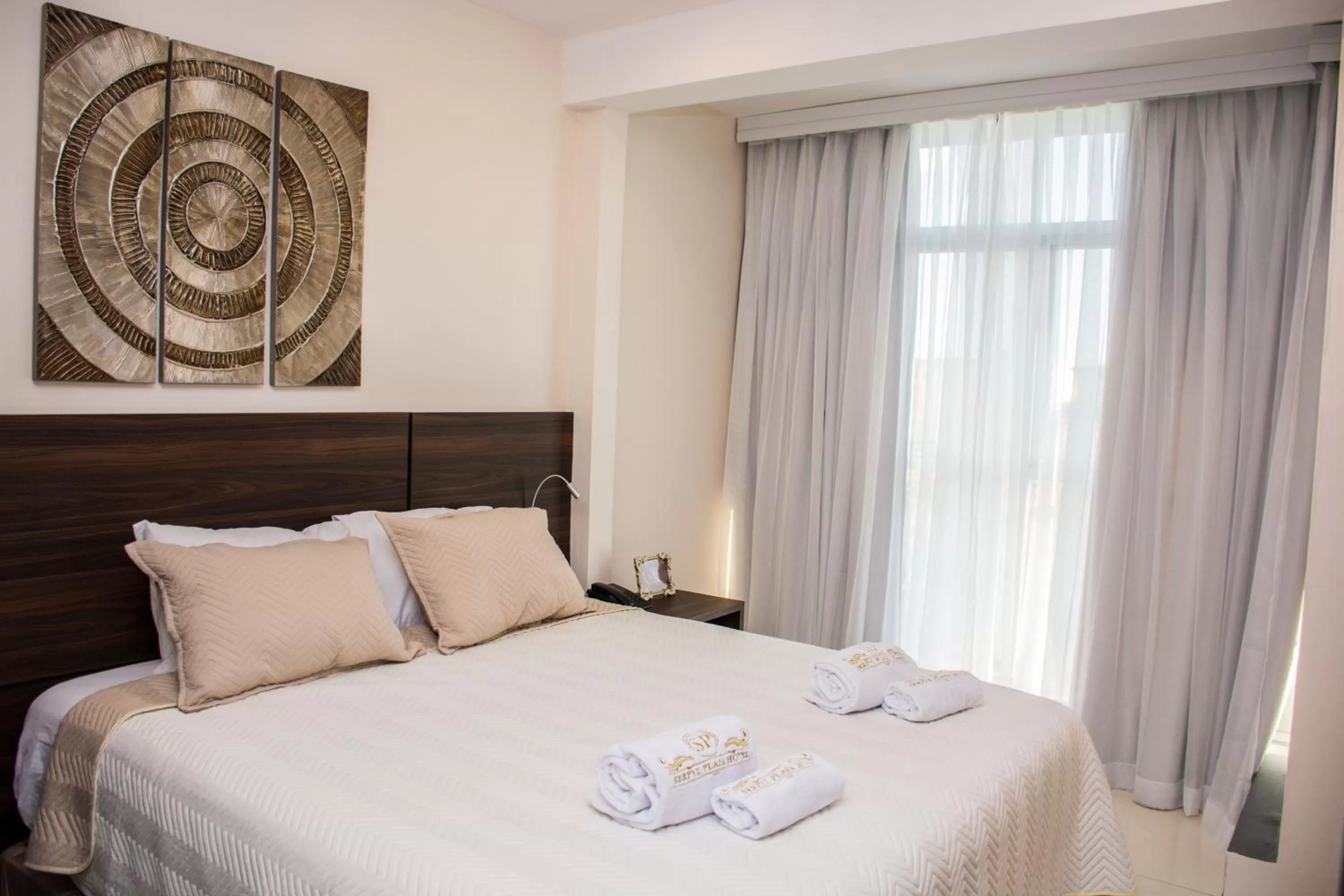 Bed in SERPYL Plaza Hotel