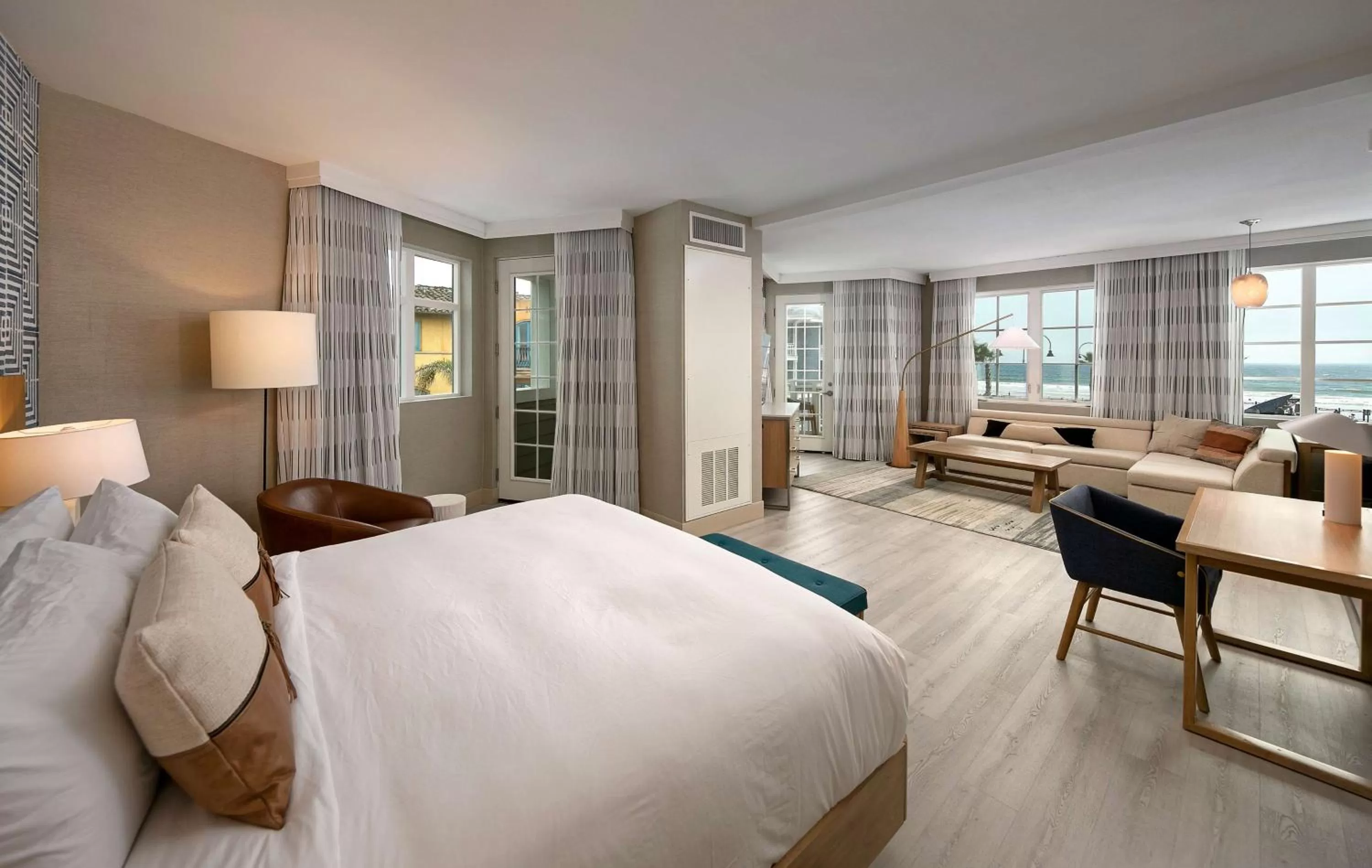 Living room, Bed in Inn at the Pier Pismo Beach, Curio Collection by Hilton