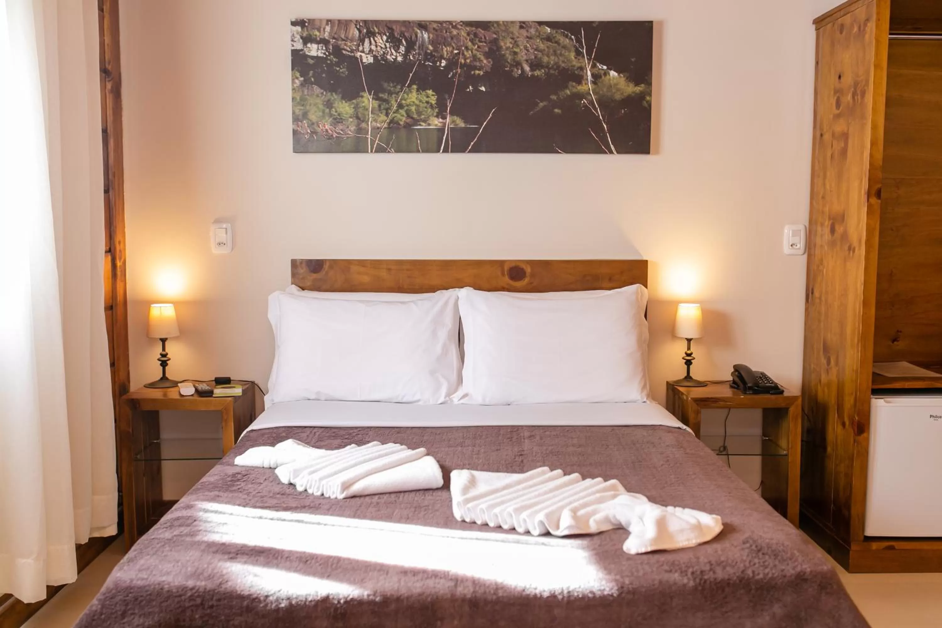 Bed in Pousada Charm Canela