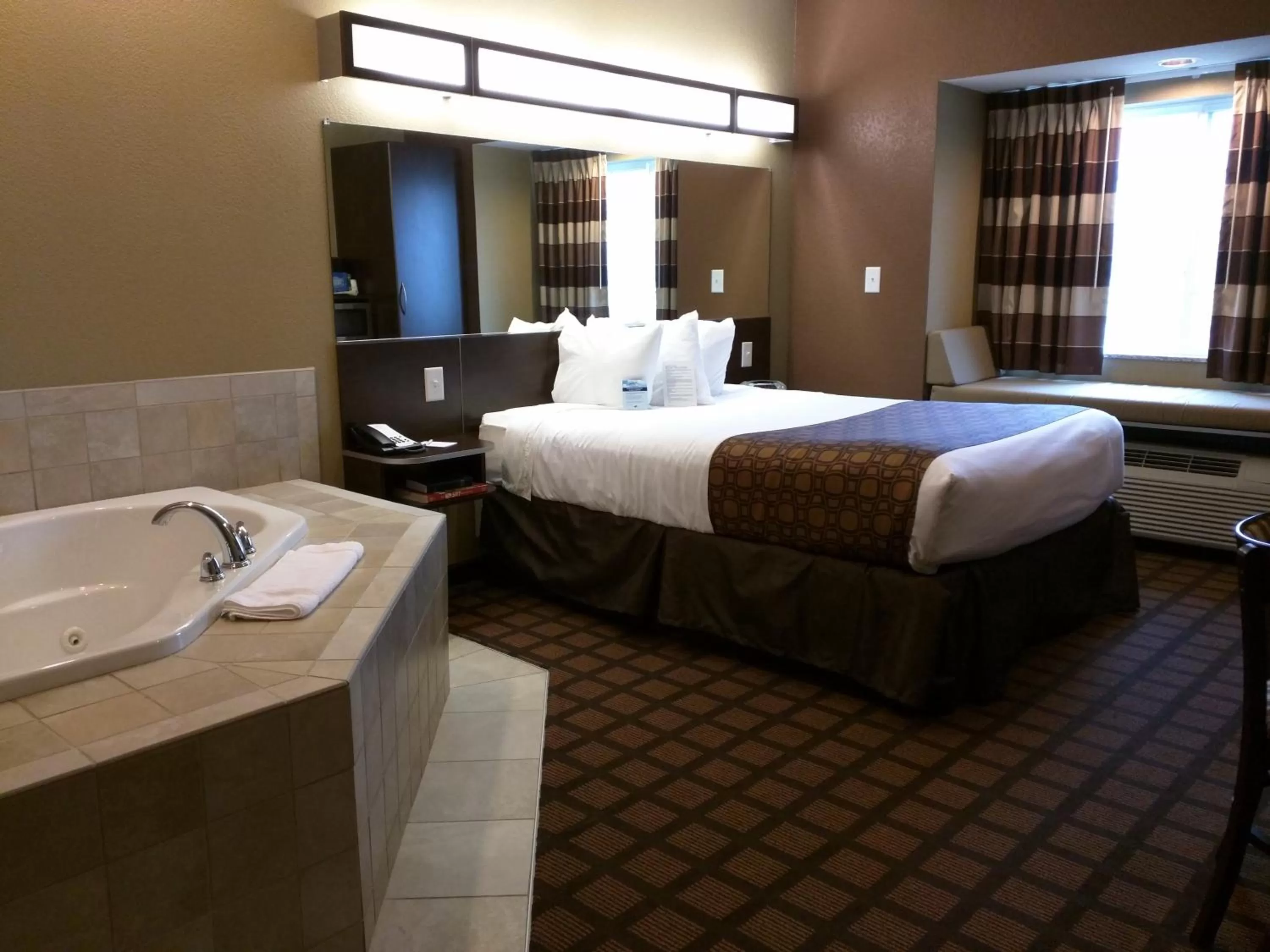 Bed in Microtel Inn & Suites by Wyndham Minot