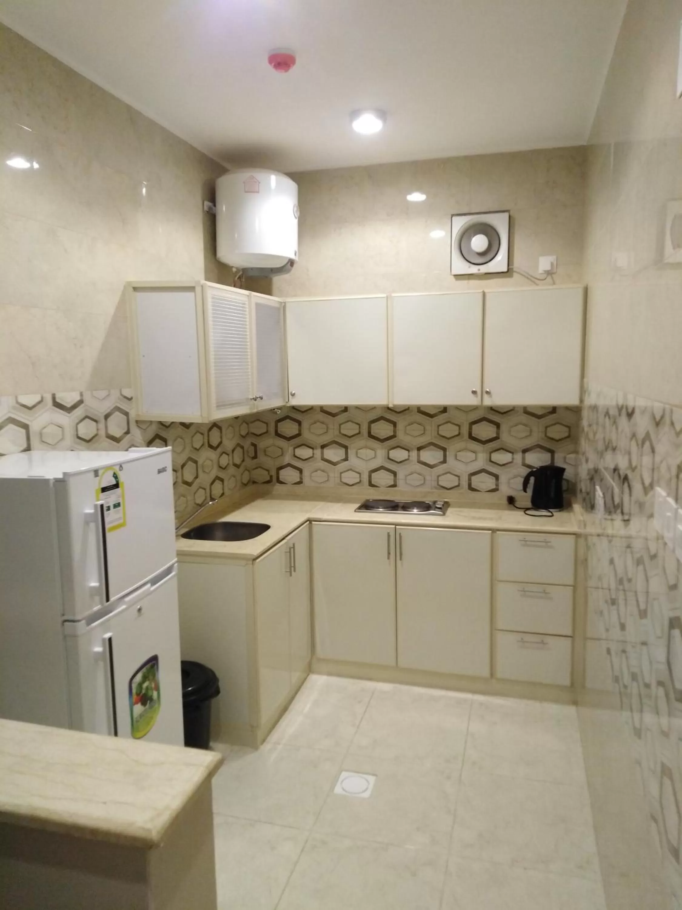 Kitchen/Kitchenette in Sunrise Furnished Apartment