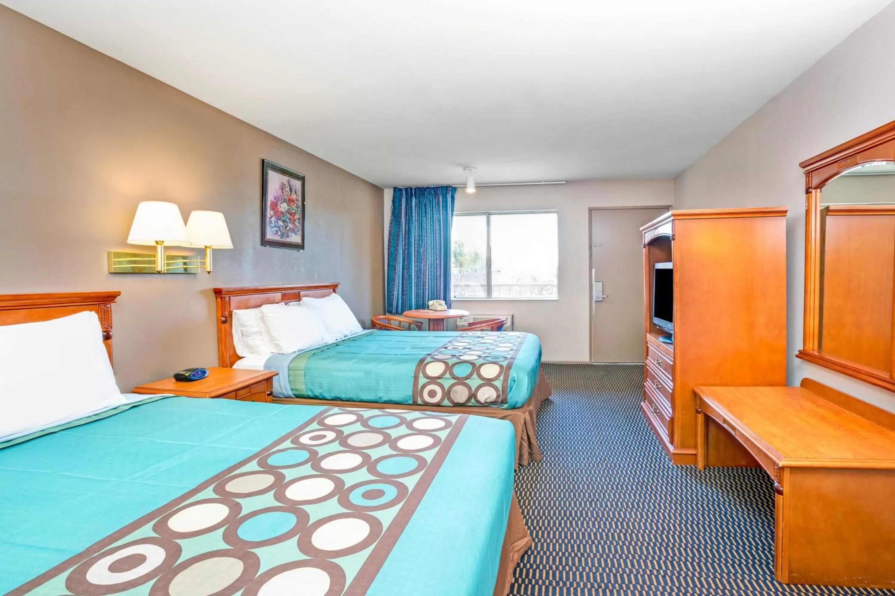 , Bed in Super 8 by Wyndham Upland Ontario CA