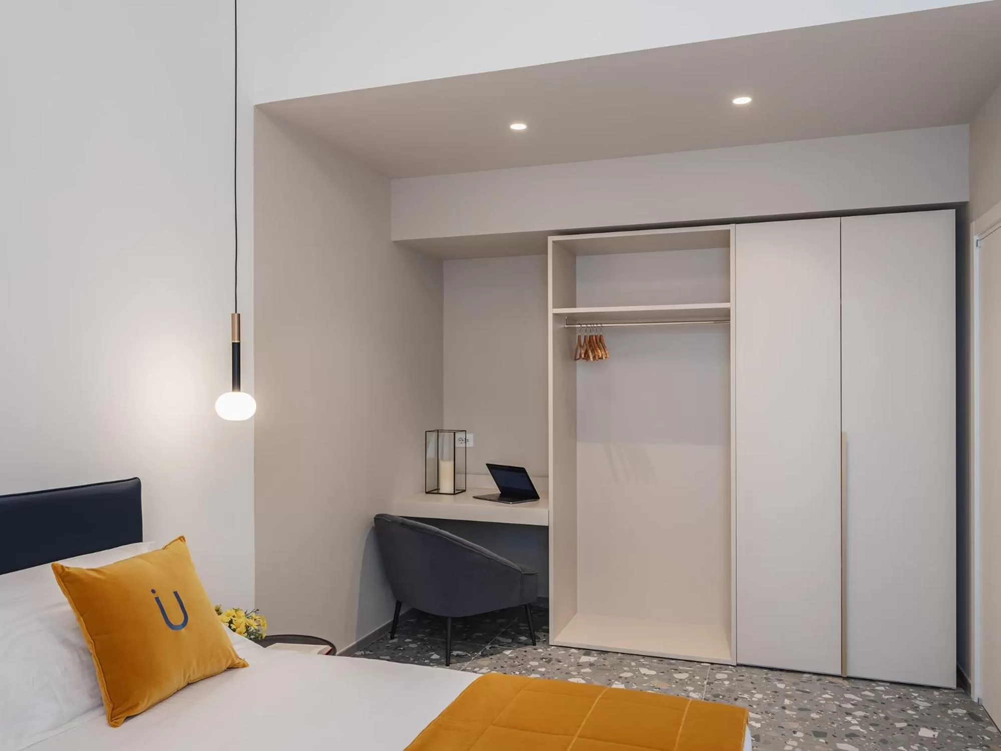 Bedroom, Bed in Living u HomeSuites