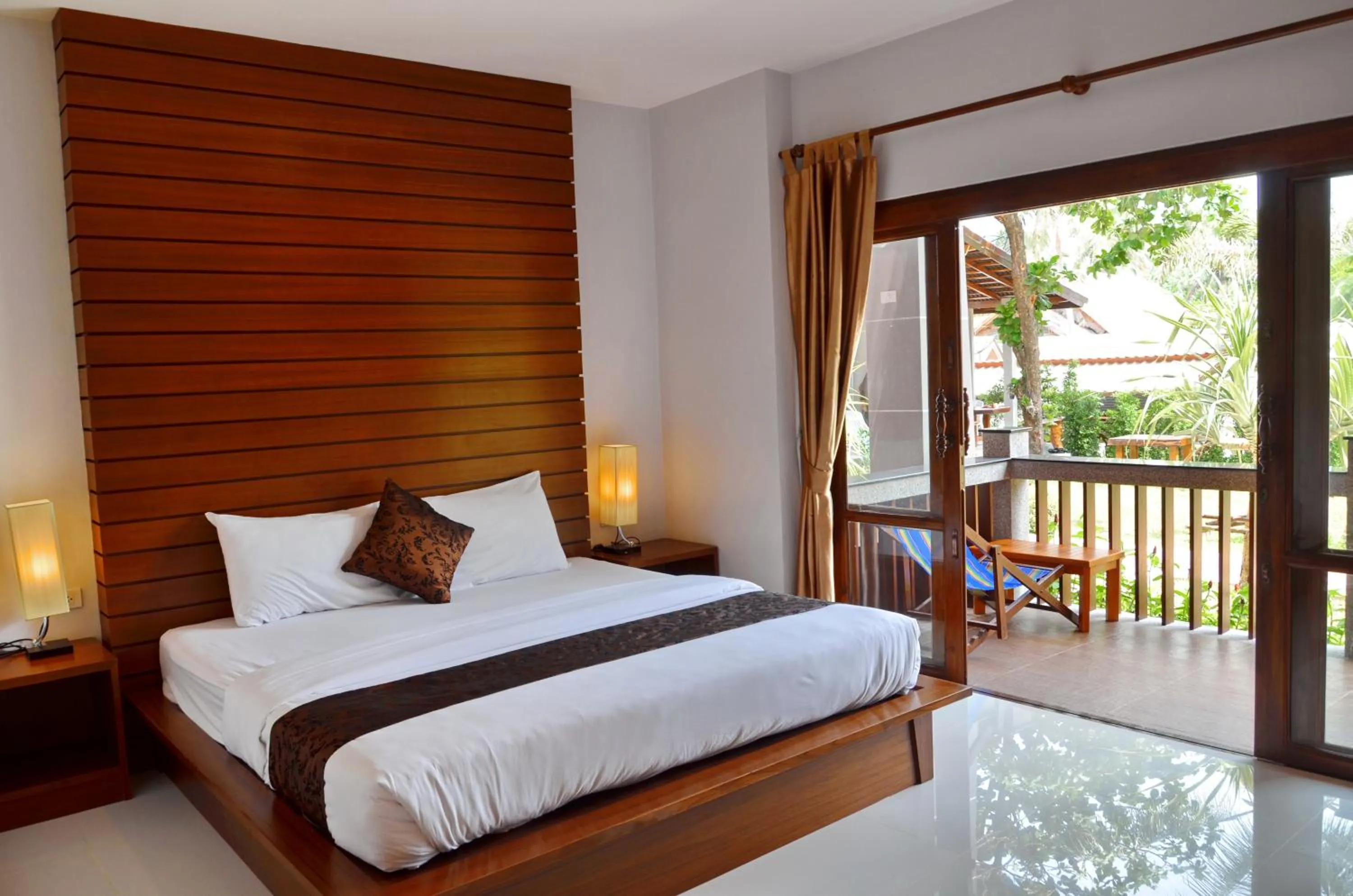 Photo of the whole room, Bed in Lanta Intanin Resort - SHA Extra Plus