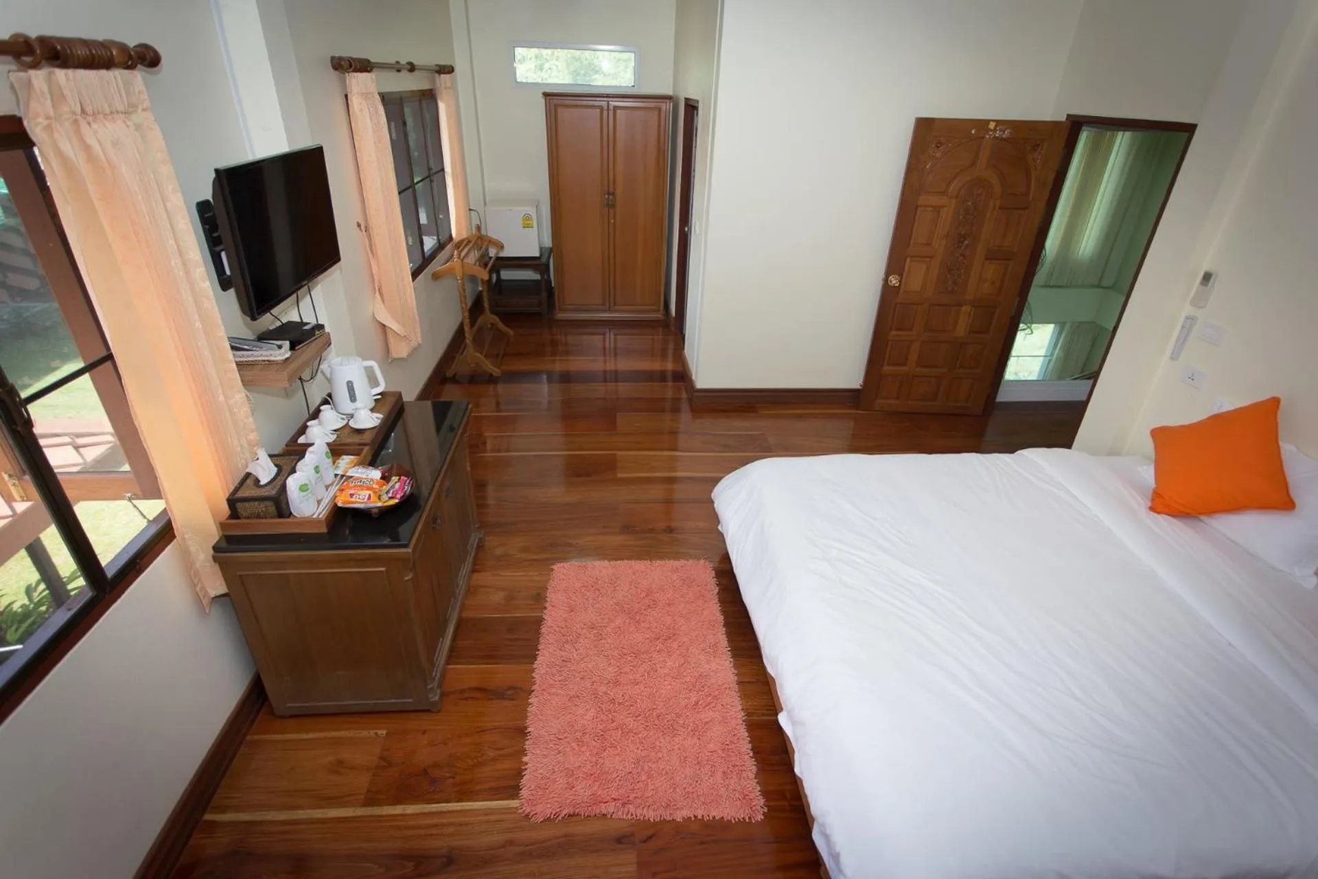 Bed in Thararin Villa