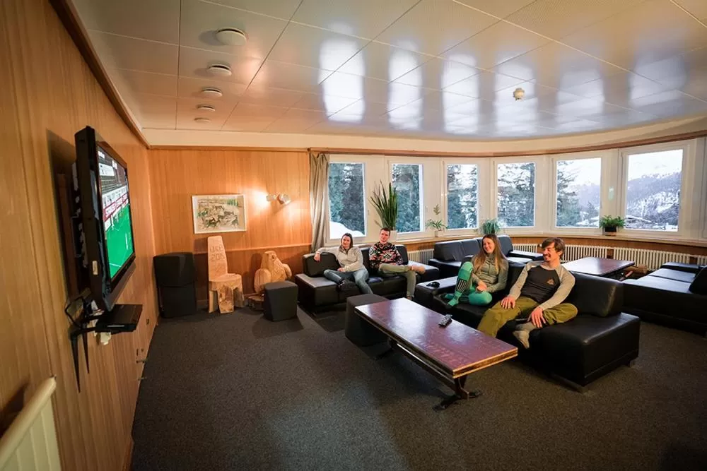 Communal lounge/ TV room in Arosa Mountain Lodge