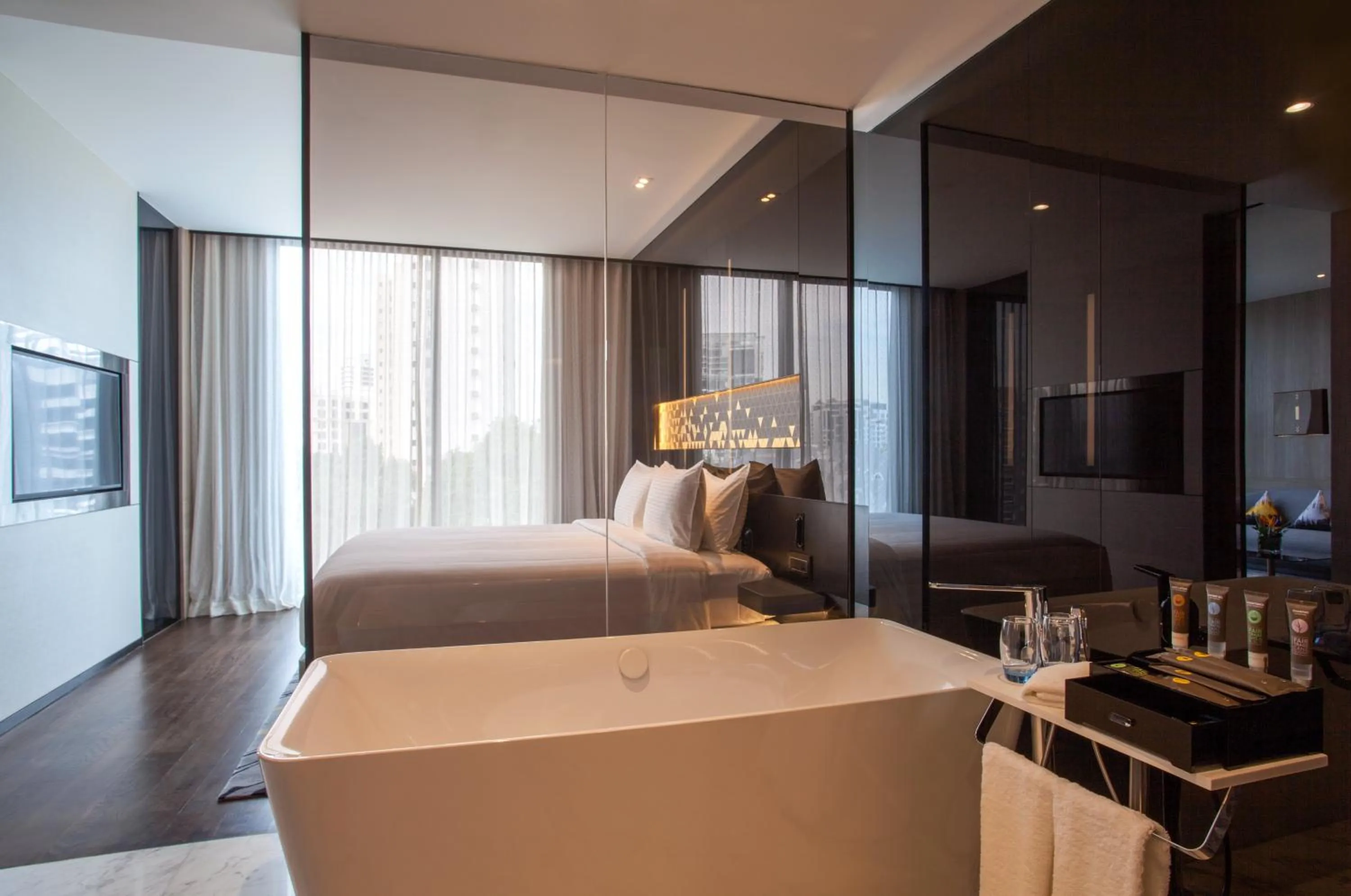 Bathroom, Bed in Novotel Singapore On Stevens