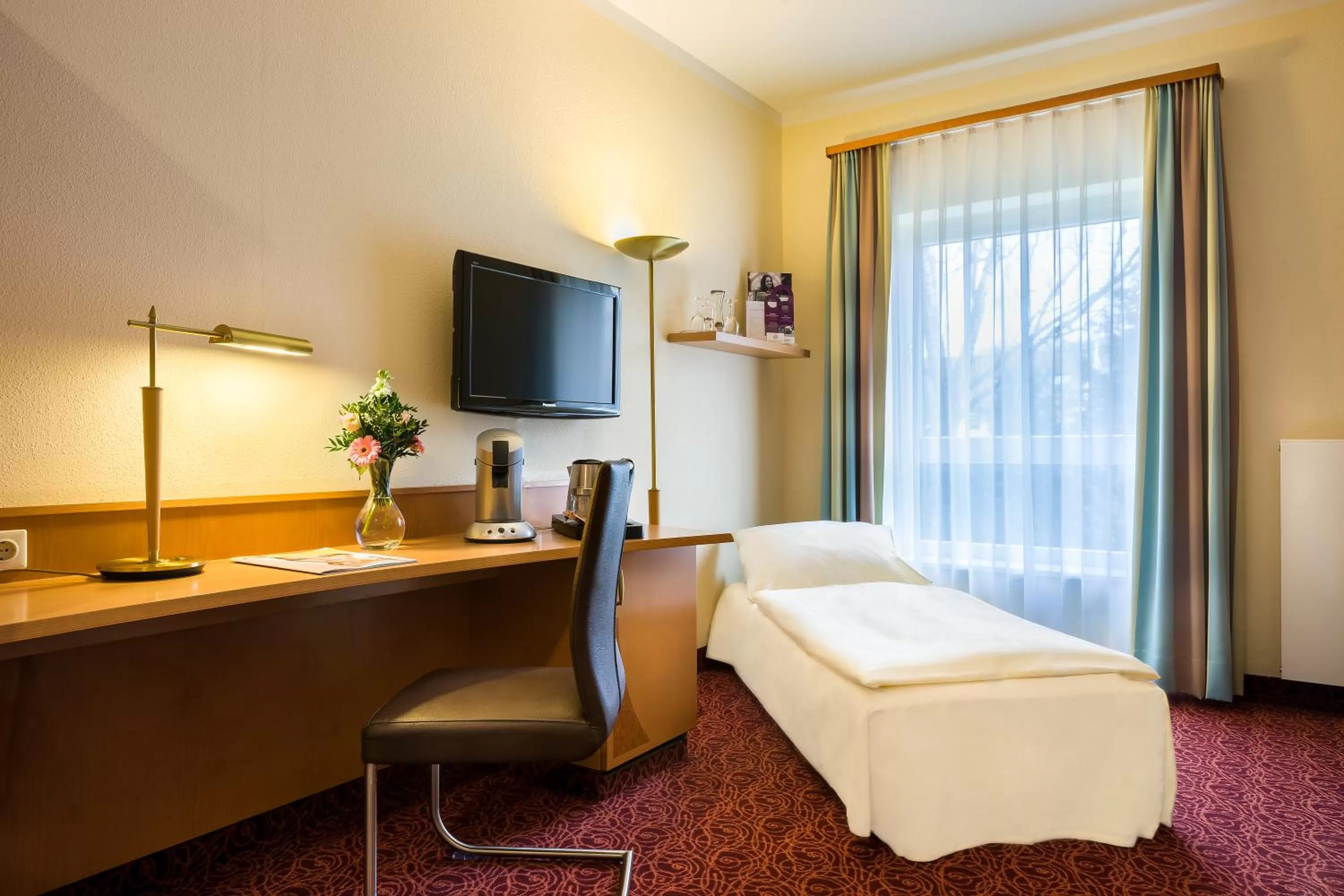 Photo of the whole room, Bed in Mercure Hotel Ingolstadt