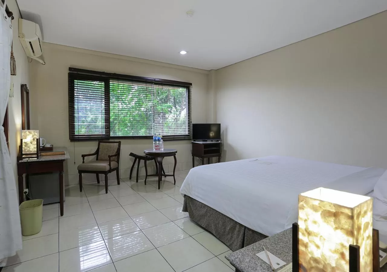 Garden view, Bed in The Jayakarta Suites Komodo Flores