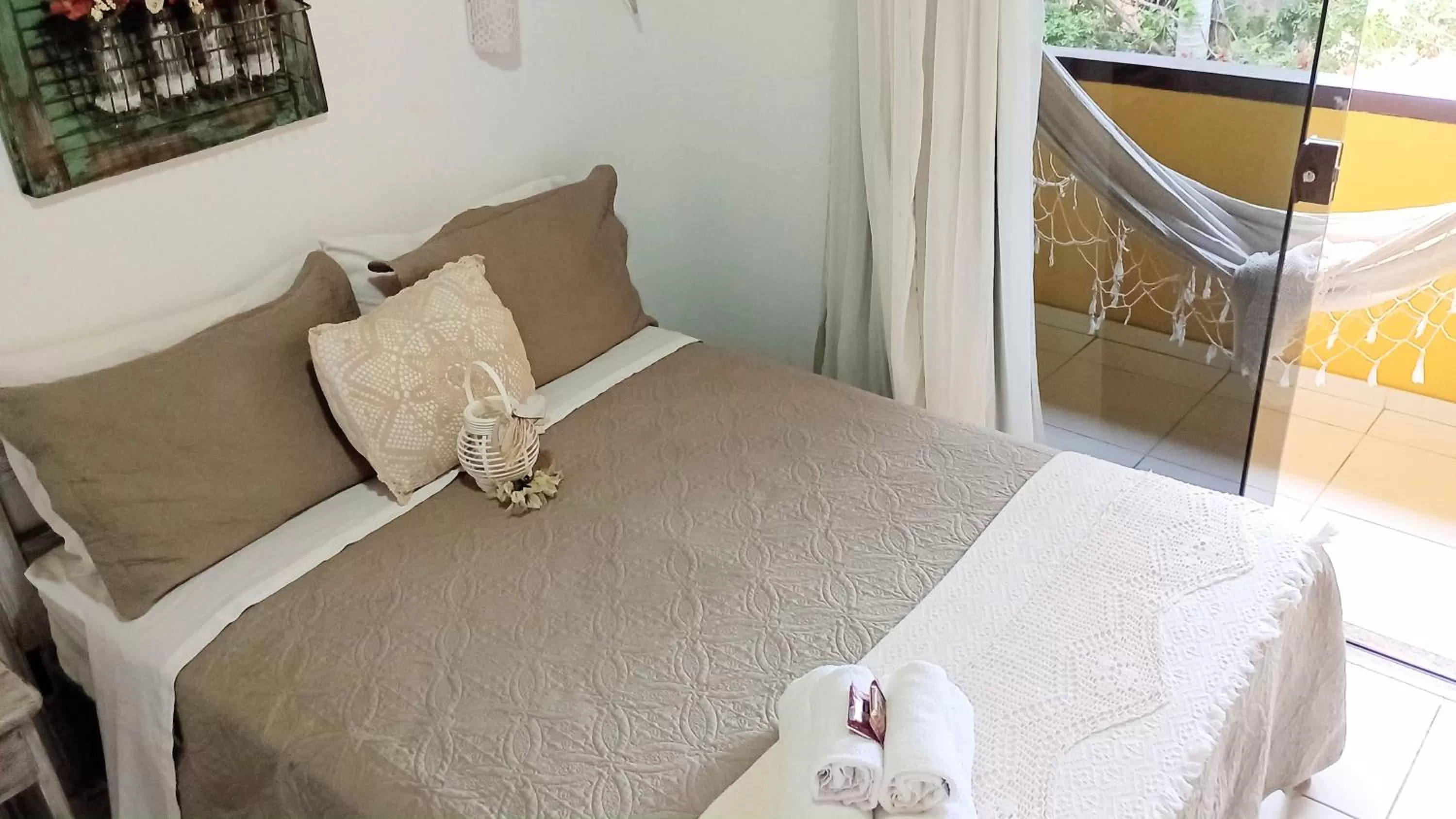 Bed in Hibiscos Pousada