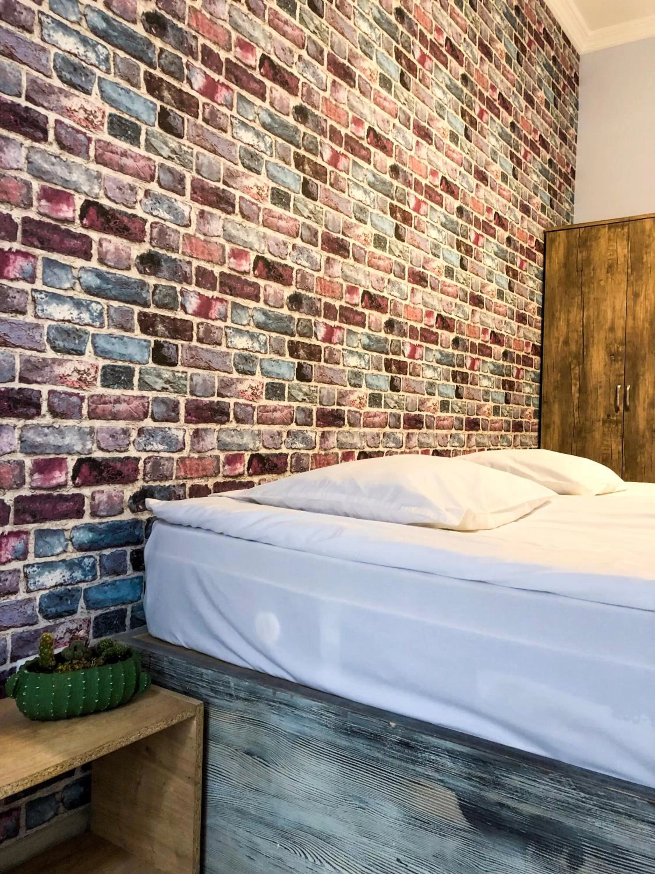 Bedroom in Check Point Hotel