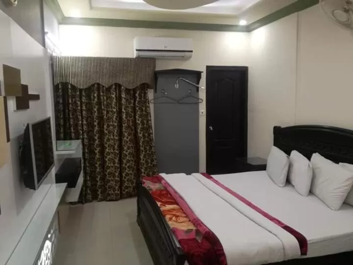 Bed in Hotel Grace inn