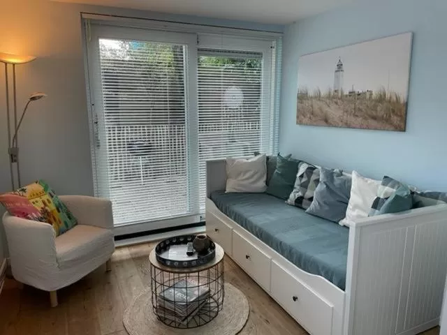 Bed, Seating Area in BeachHouse Oase aan Zee