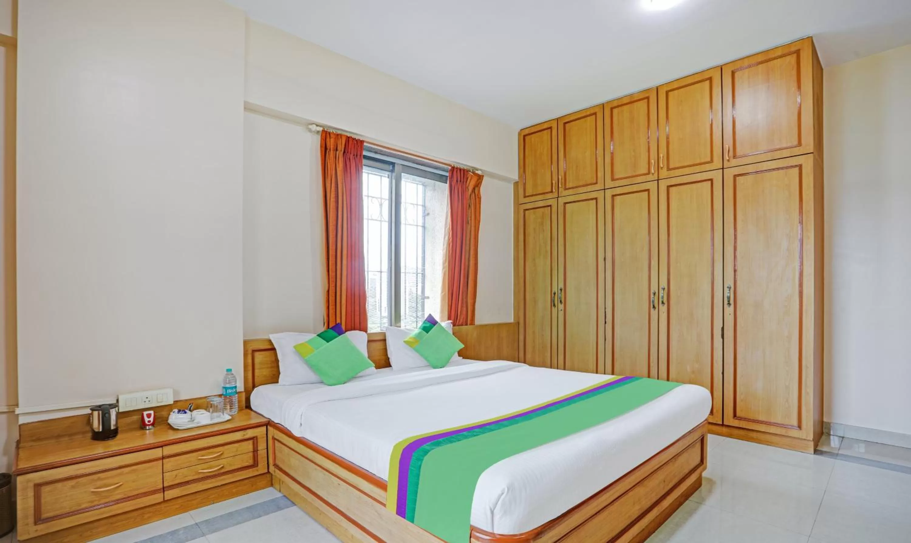 Bed in Treebo Trend Welcome Apartments