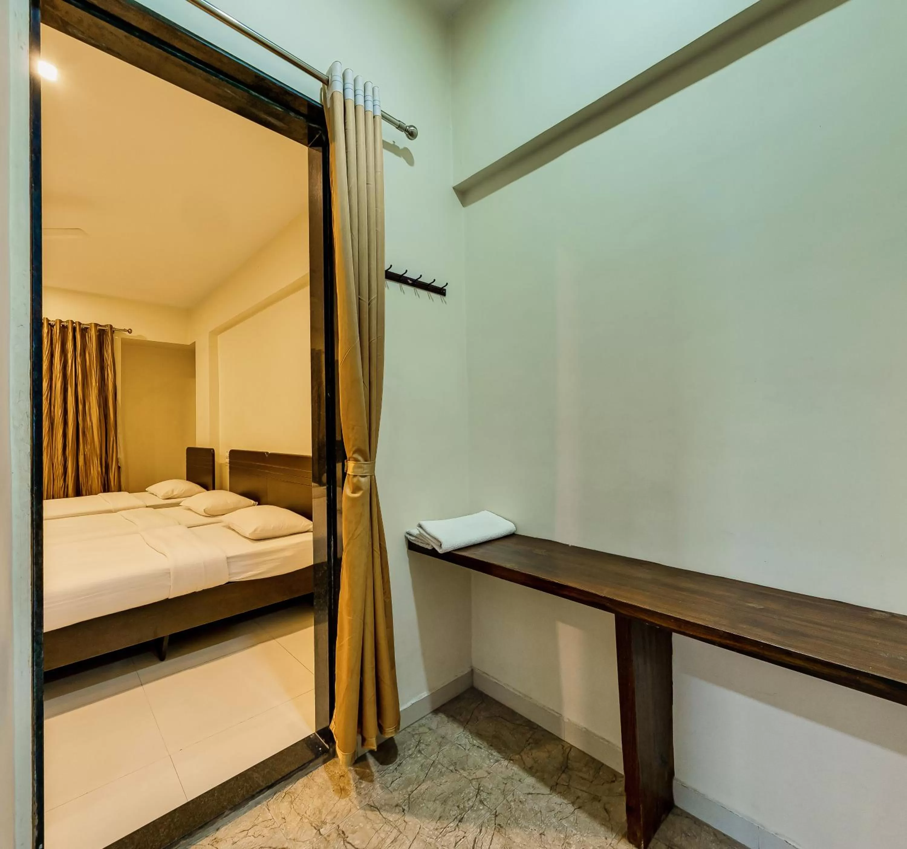 Bed in Hotel Galaxy Inn Kolhapur