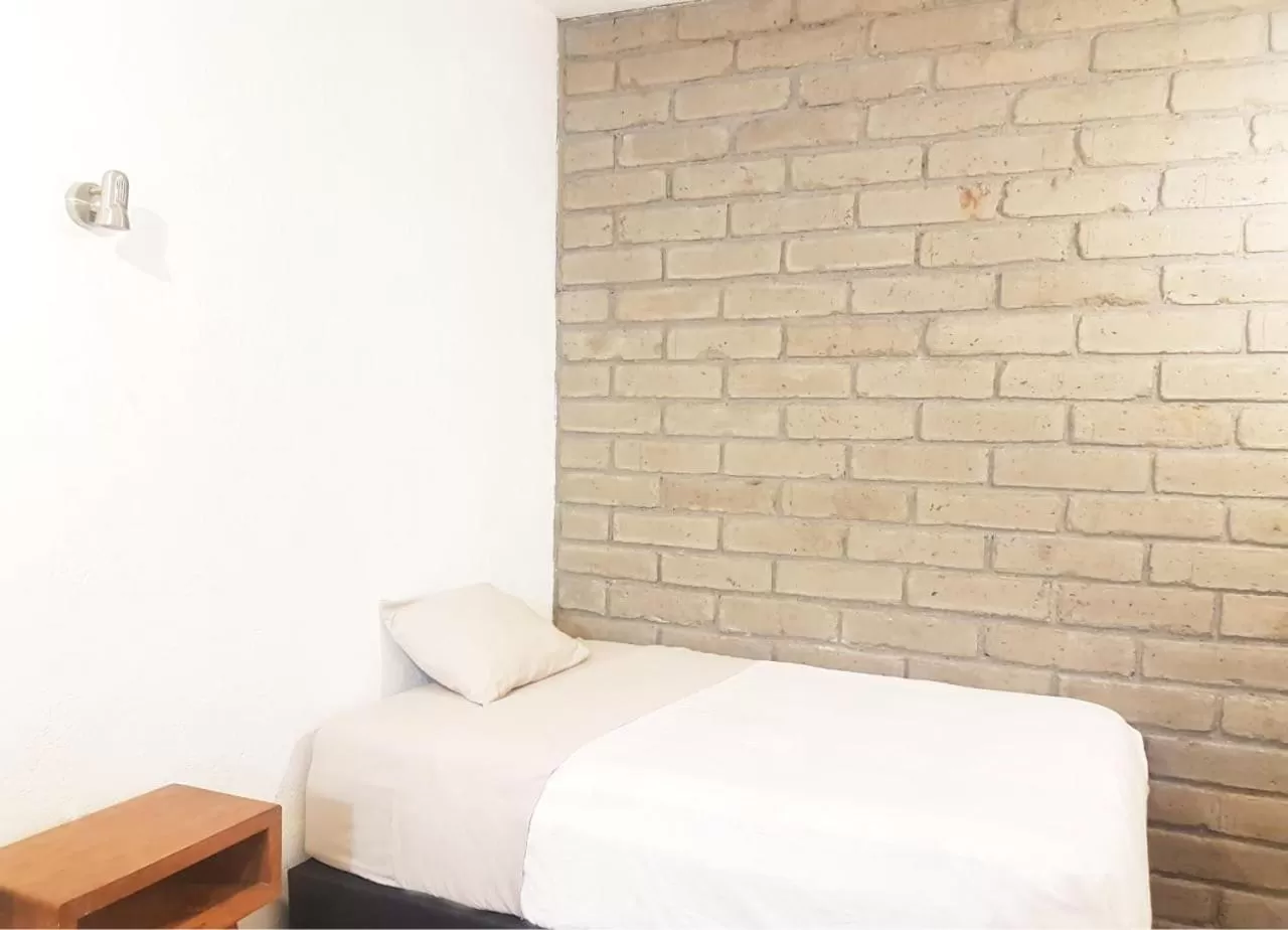 Bed in Hostal Hoja Santa