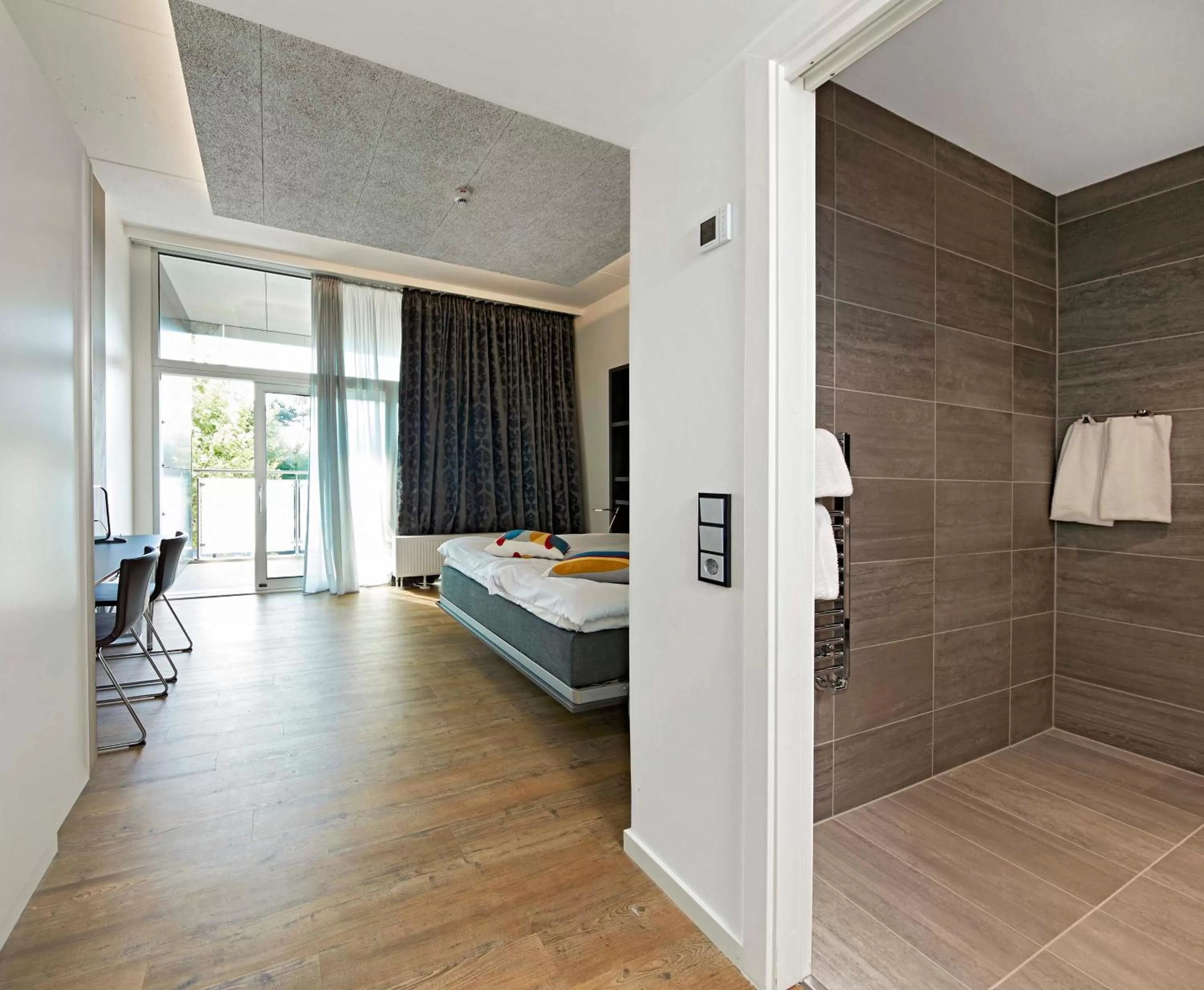 Toilet, Bed in Living Suites