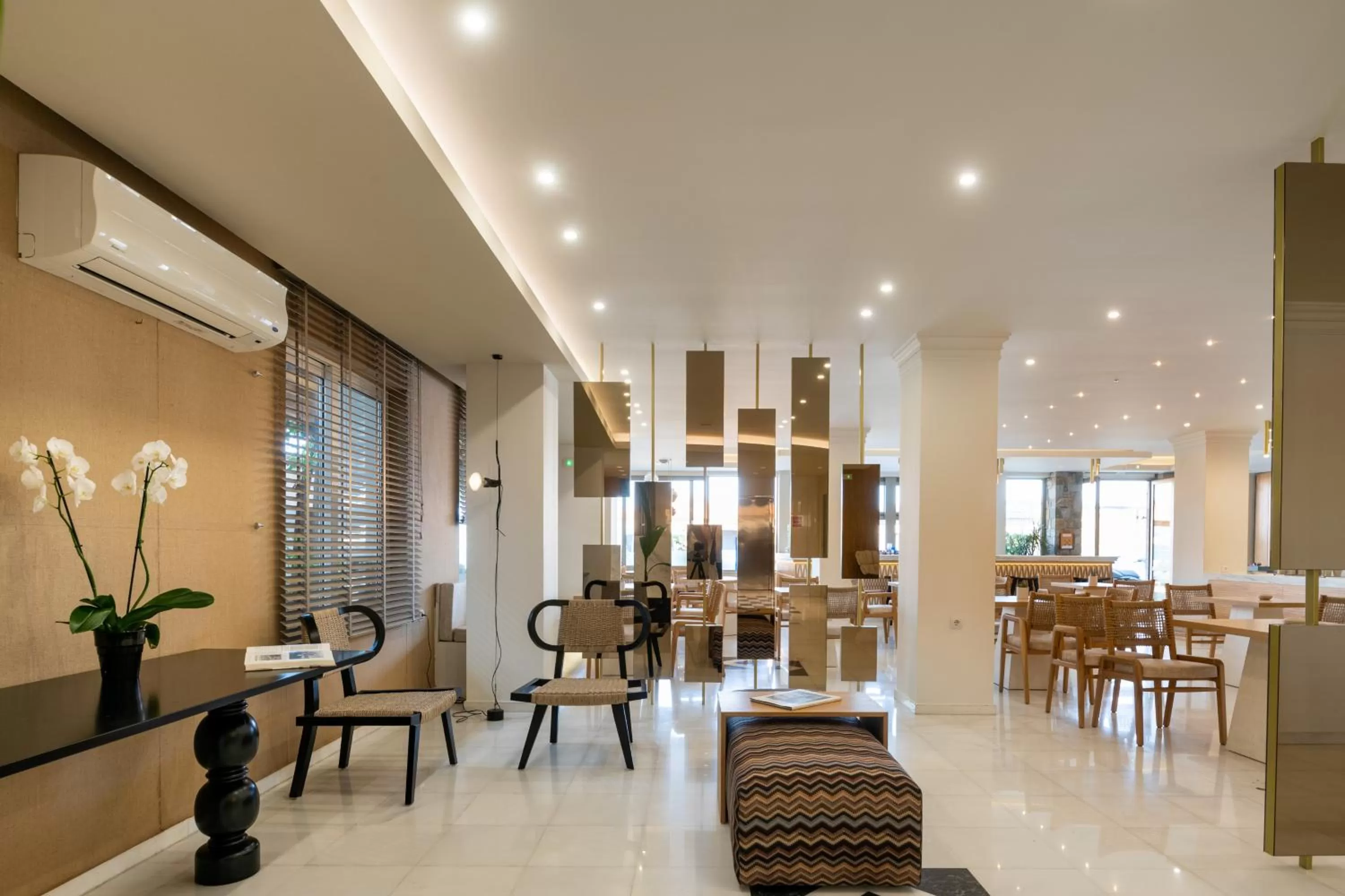 Communal lounge/ TV room in Elounda Akti Olous (Adults Only)