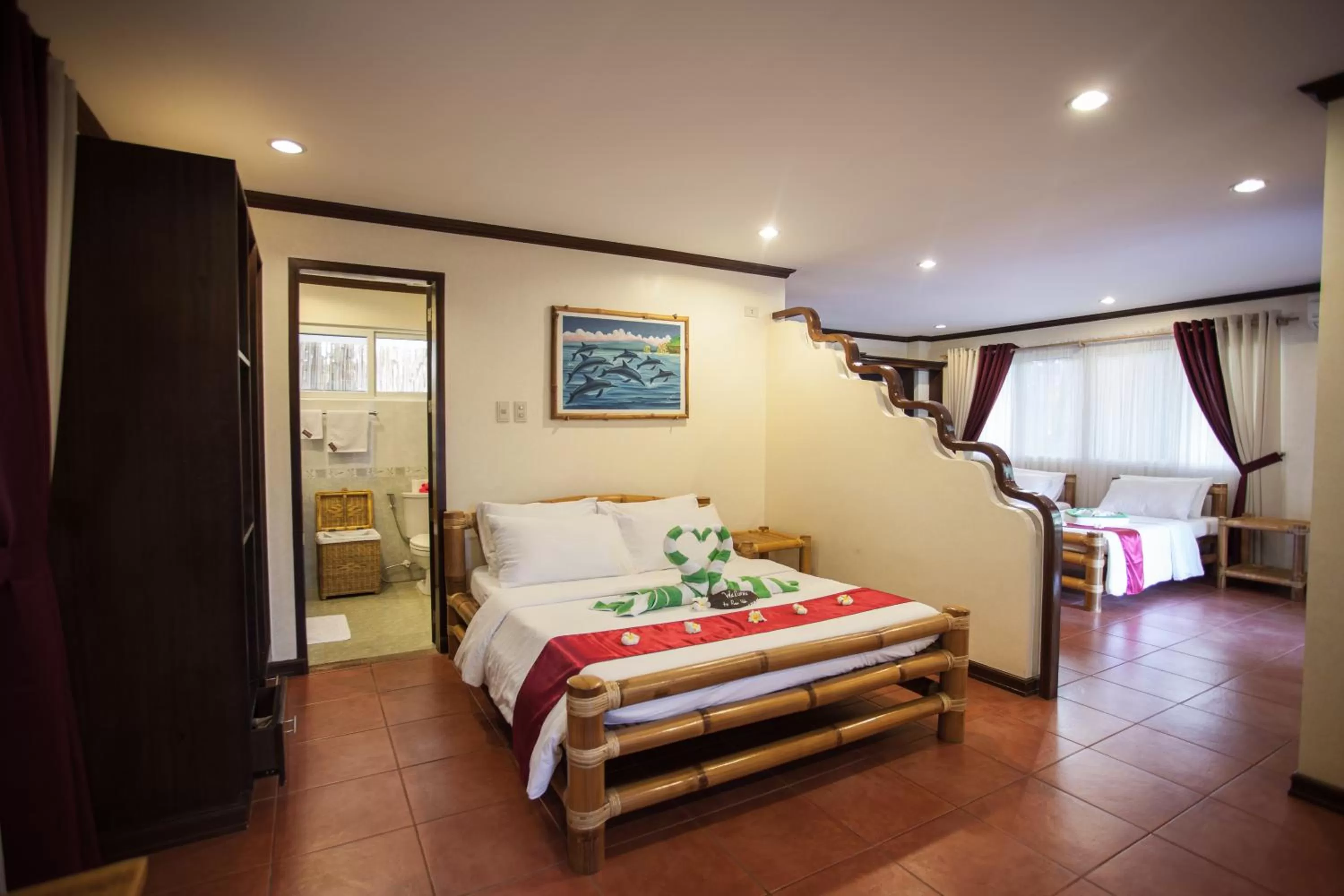 Photo of the whole room, Bed in Pura Vida Beach & Dive Resort