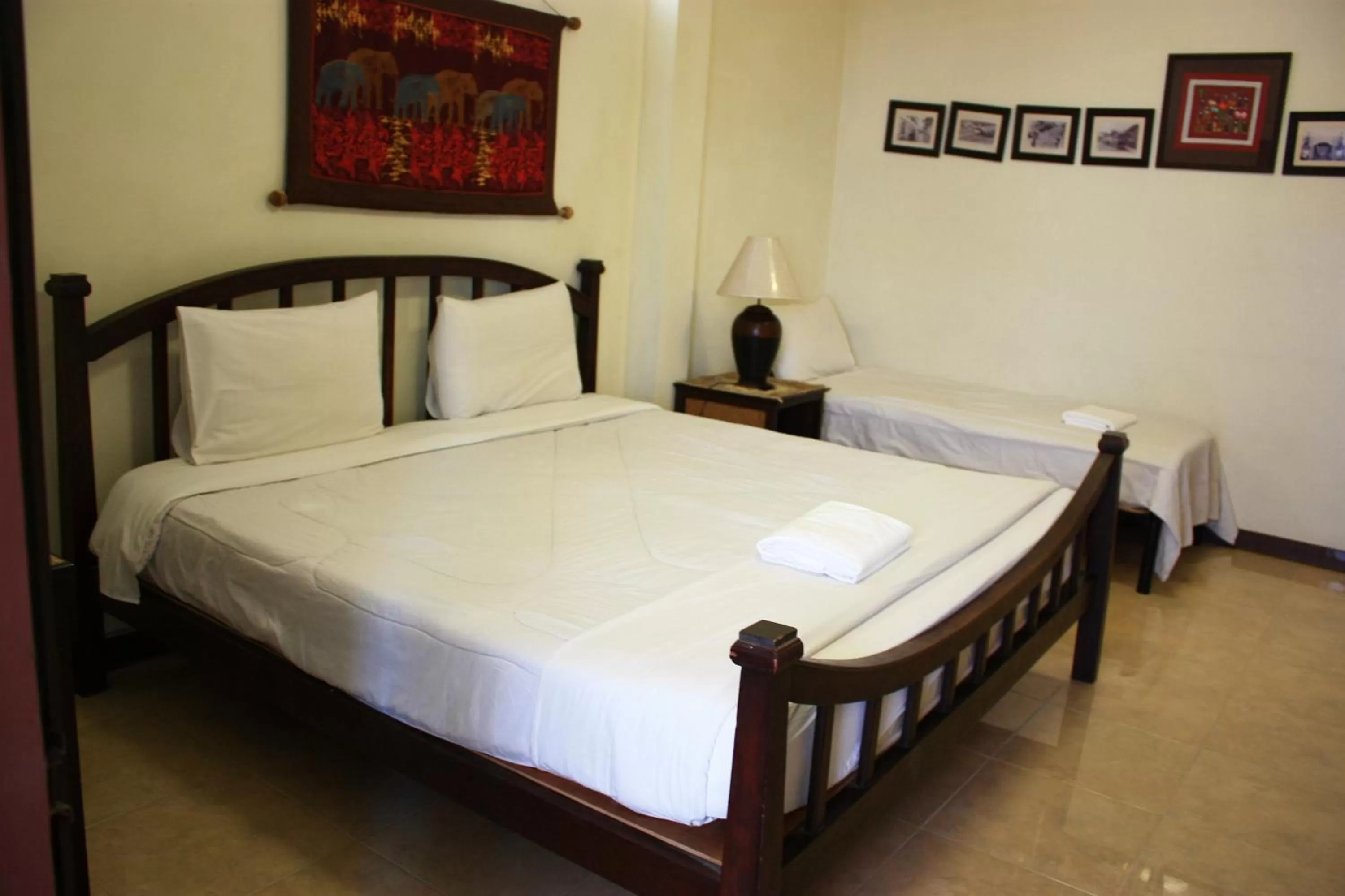 Bed in โรงแรมตีฆ้อง - Tri Gong Hotel