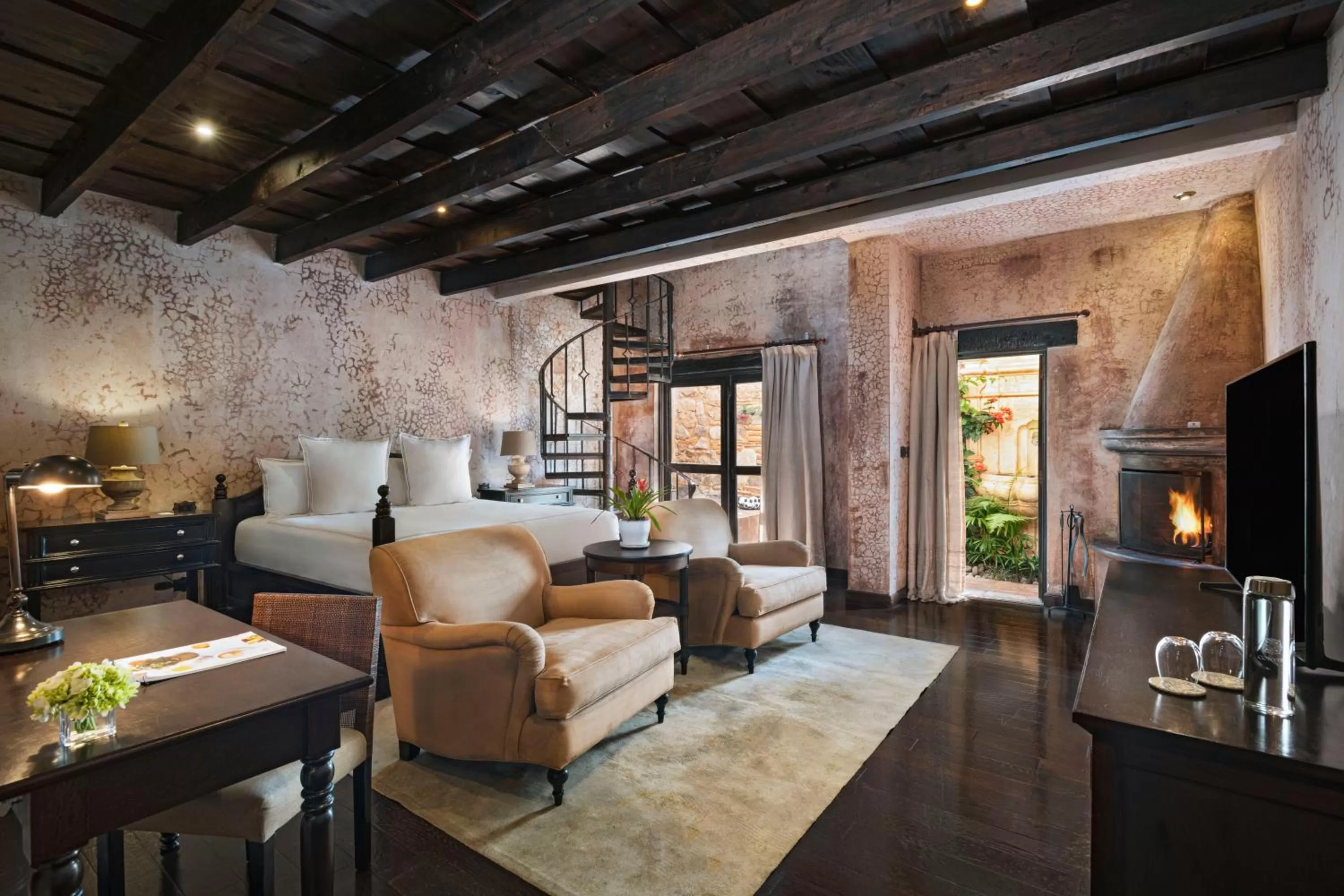 Bedroom in El Convento Boutique Hotel