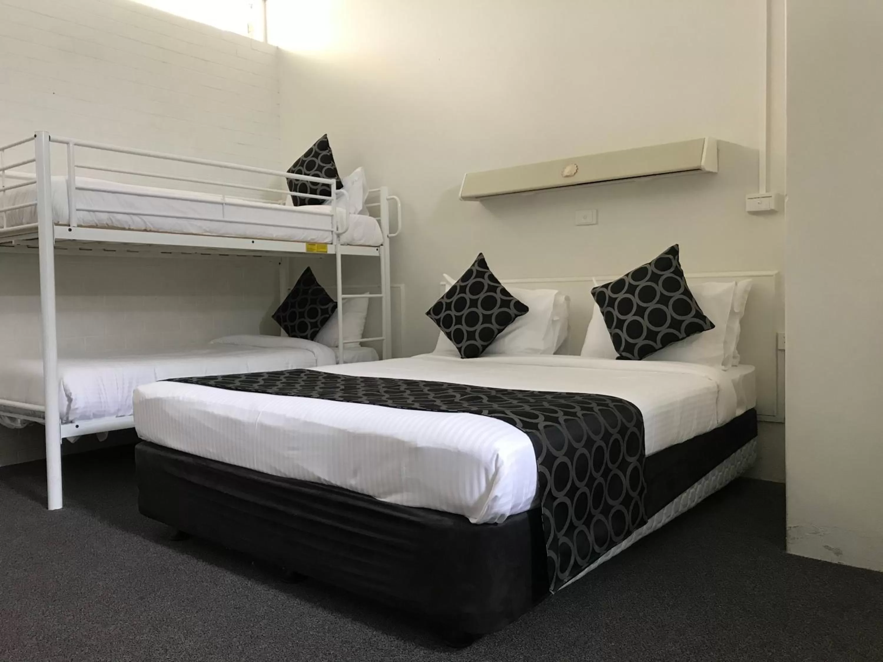 Bed in Coffs Shearwater Motel