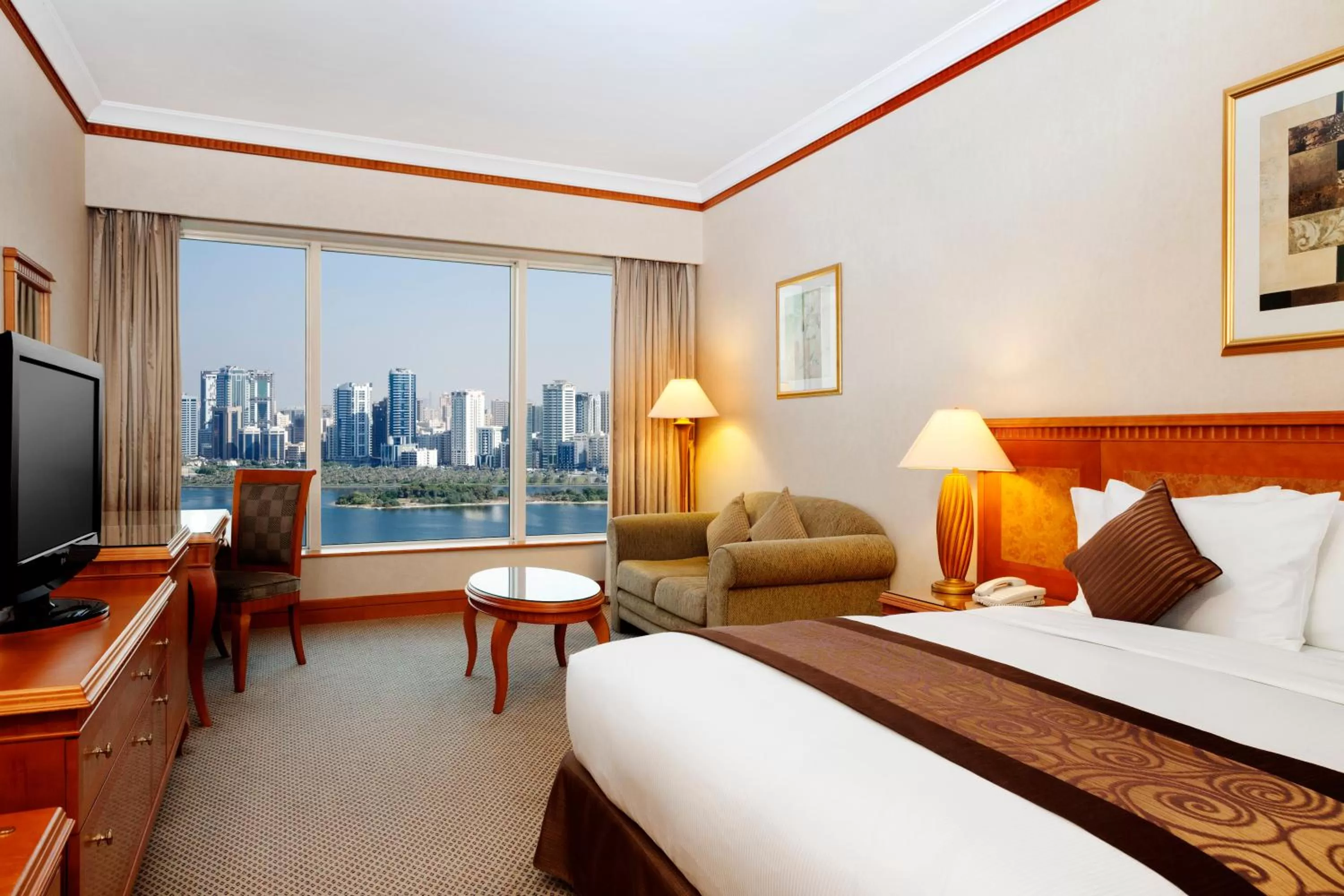 View (from property/room), Bed in Corniche Hotel Sharjah