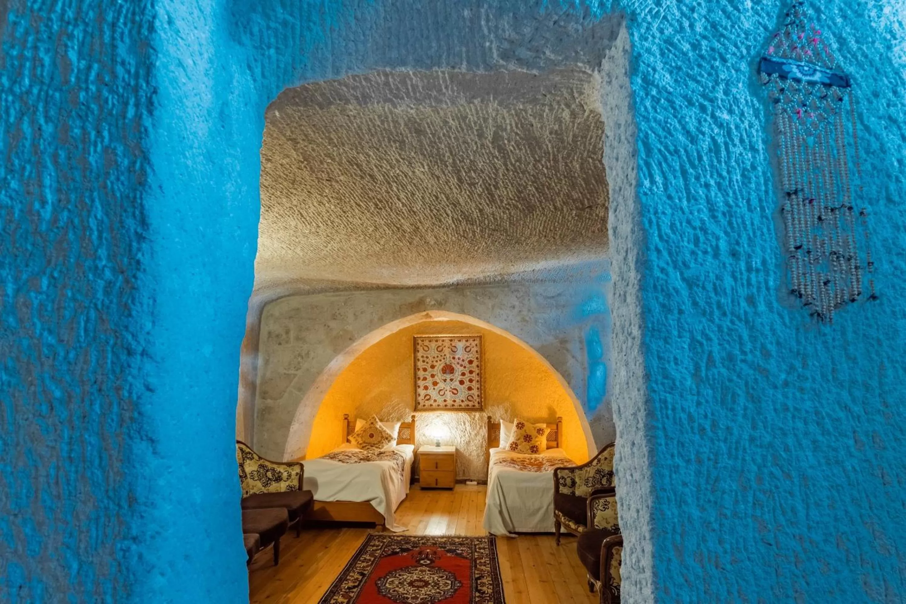 Bedroom, Bed in Amber Cave Suites