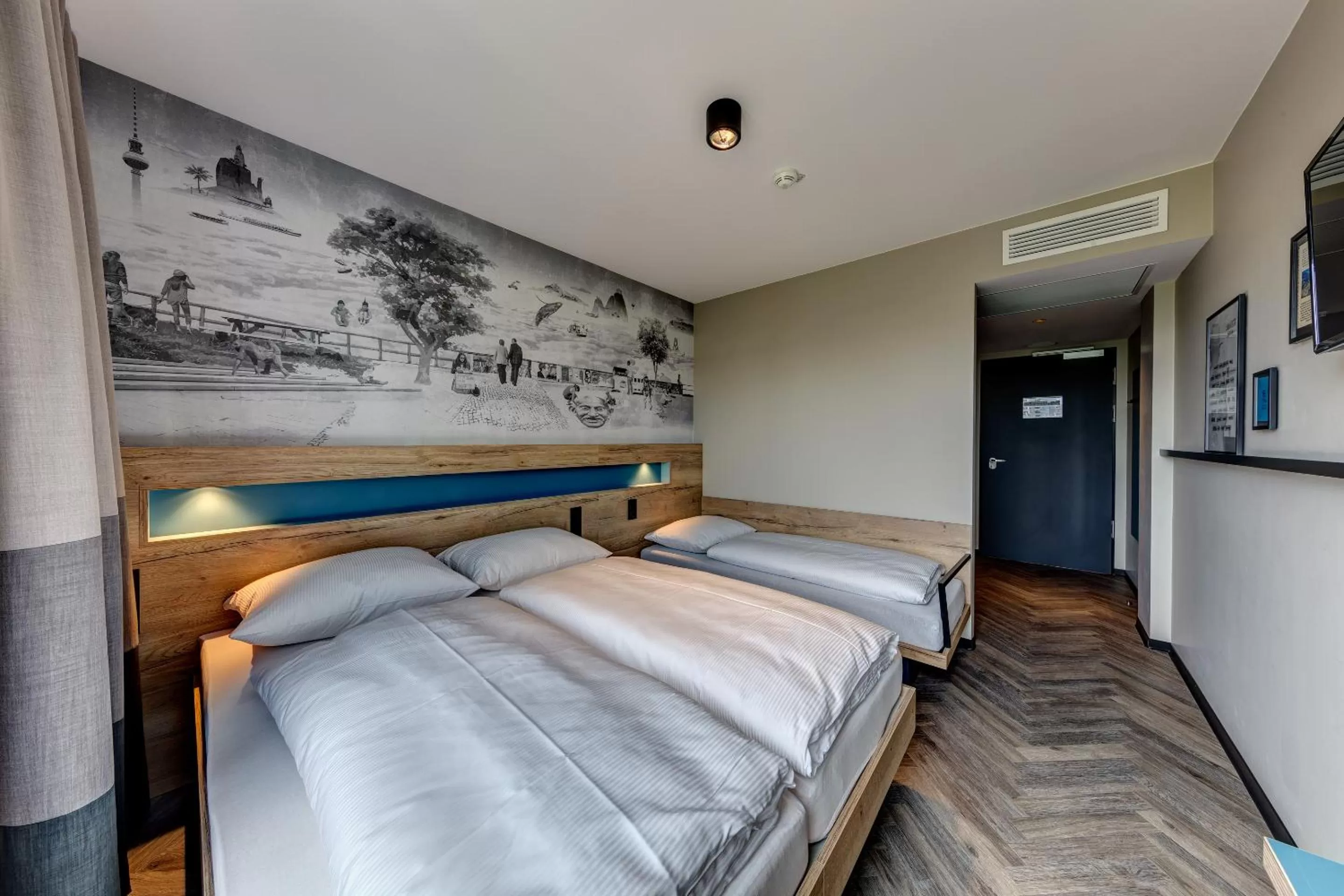 Bed in Schulz Hotel Berlin Wall at the East Side Gallery