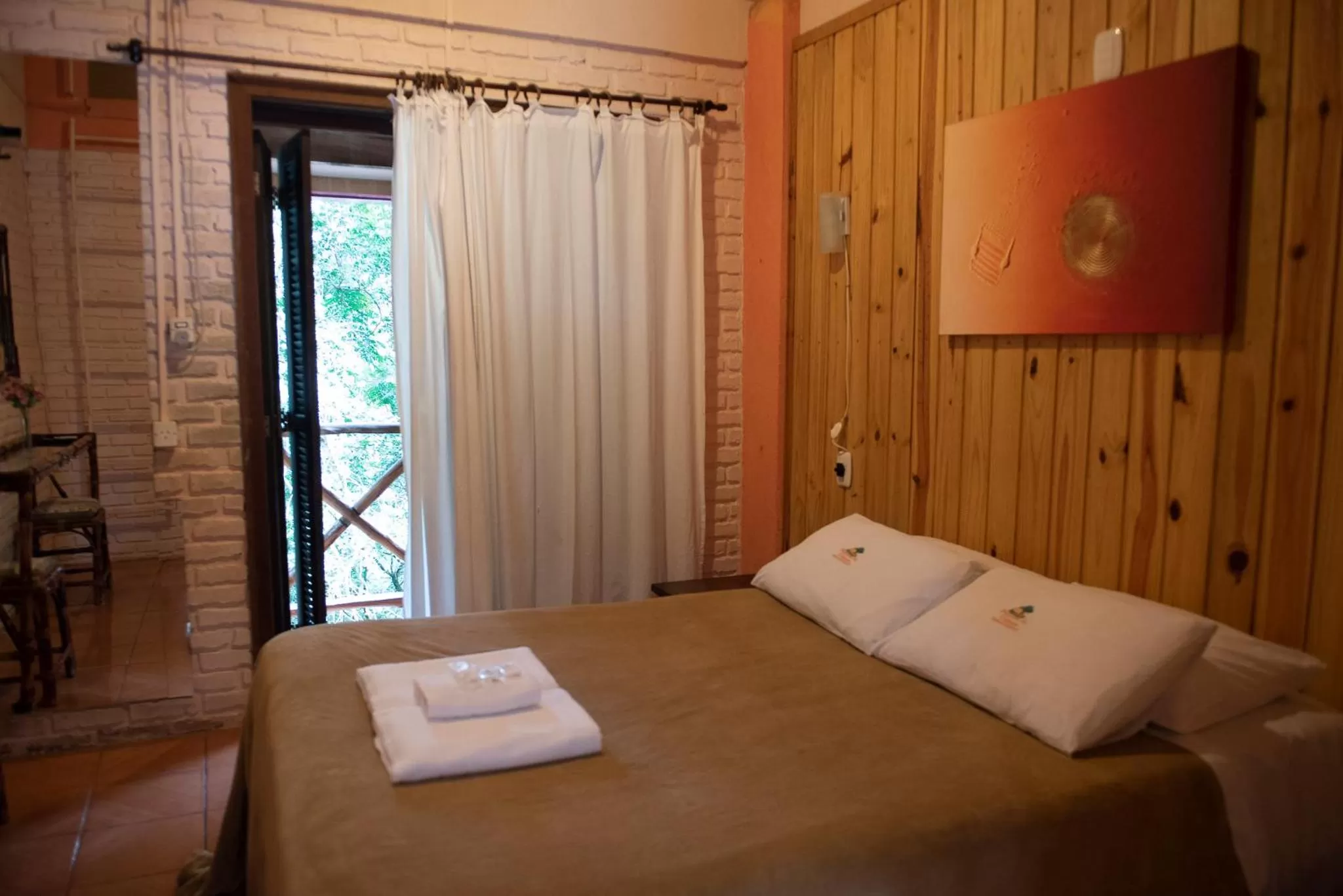 Bed in Pousada da Chacara