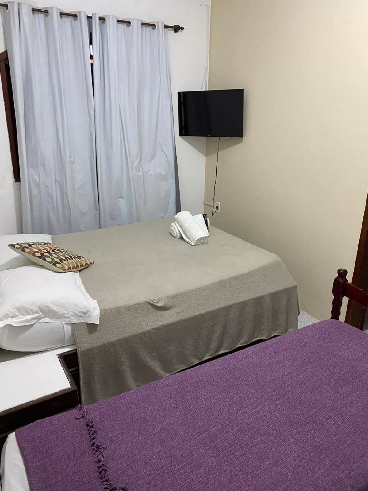 Photo of the whole room, Bed in Pousada Porto Búzios