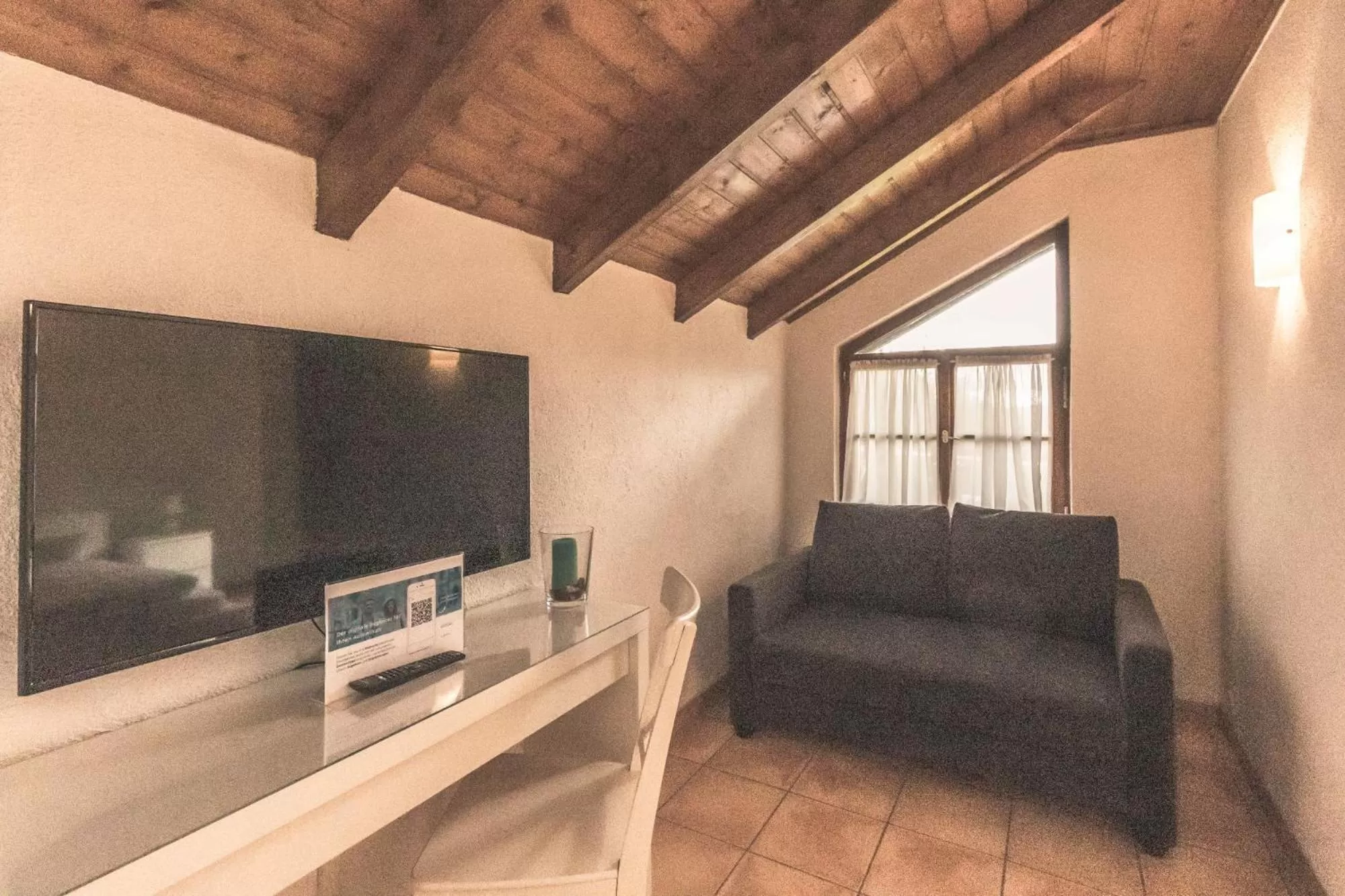 Seating area, TV/Entertainment Center in Wohlfühlhotel Landmann