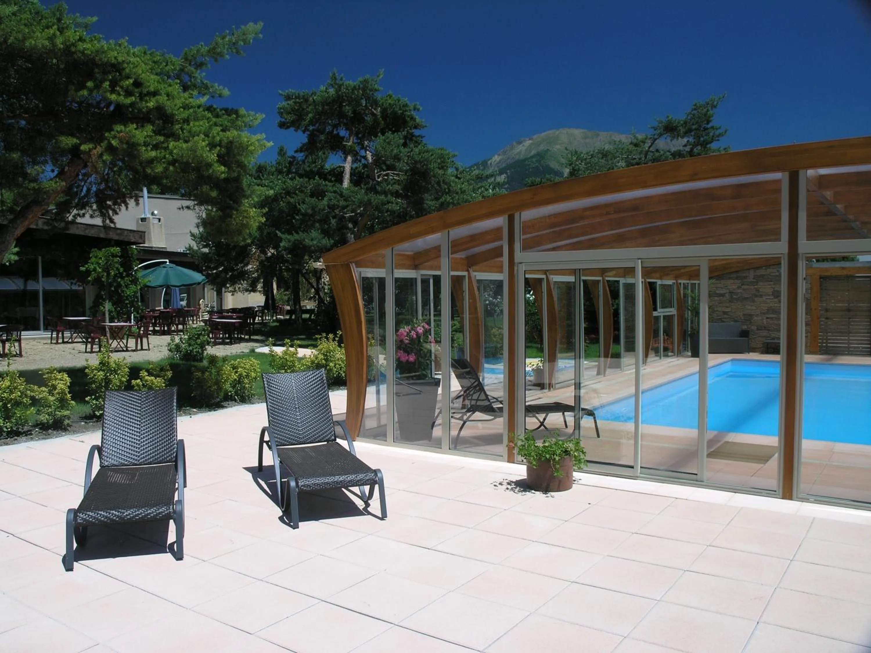 Swimming pool in Logis Hotel Le Lac